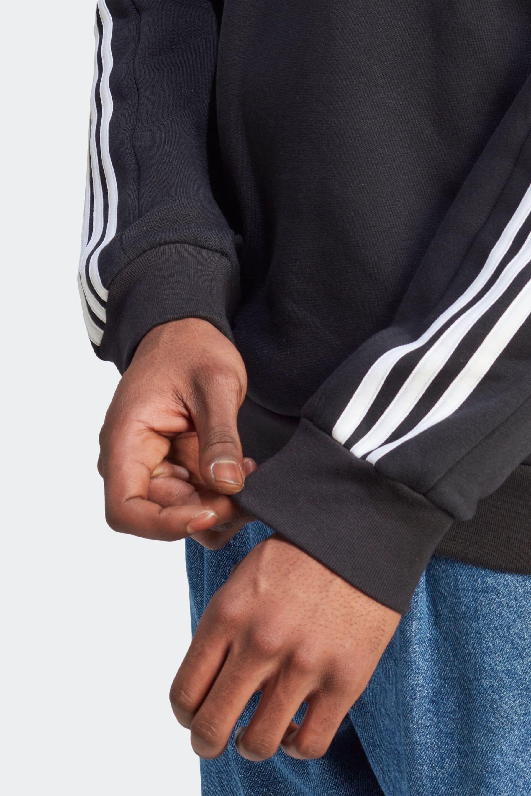 Buy adidas Black Essentials Fleece 3 Stripes Sweatshirt from Next Luxembourg