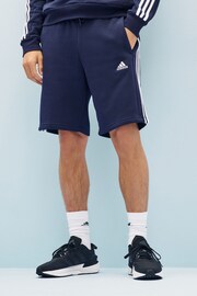 adidas Blue Sportswear Essentials Fleece 3-Stripes Shorts - Image 1 of 5