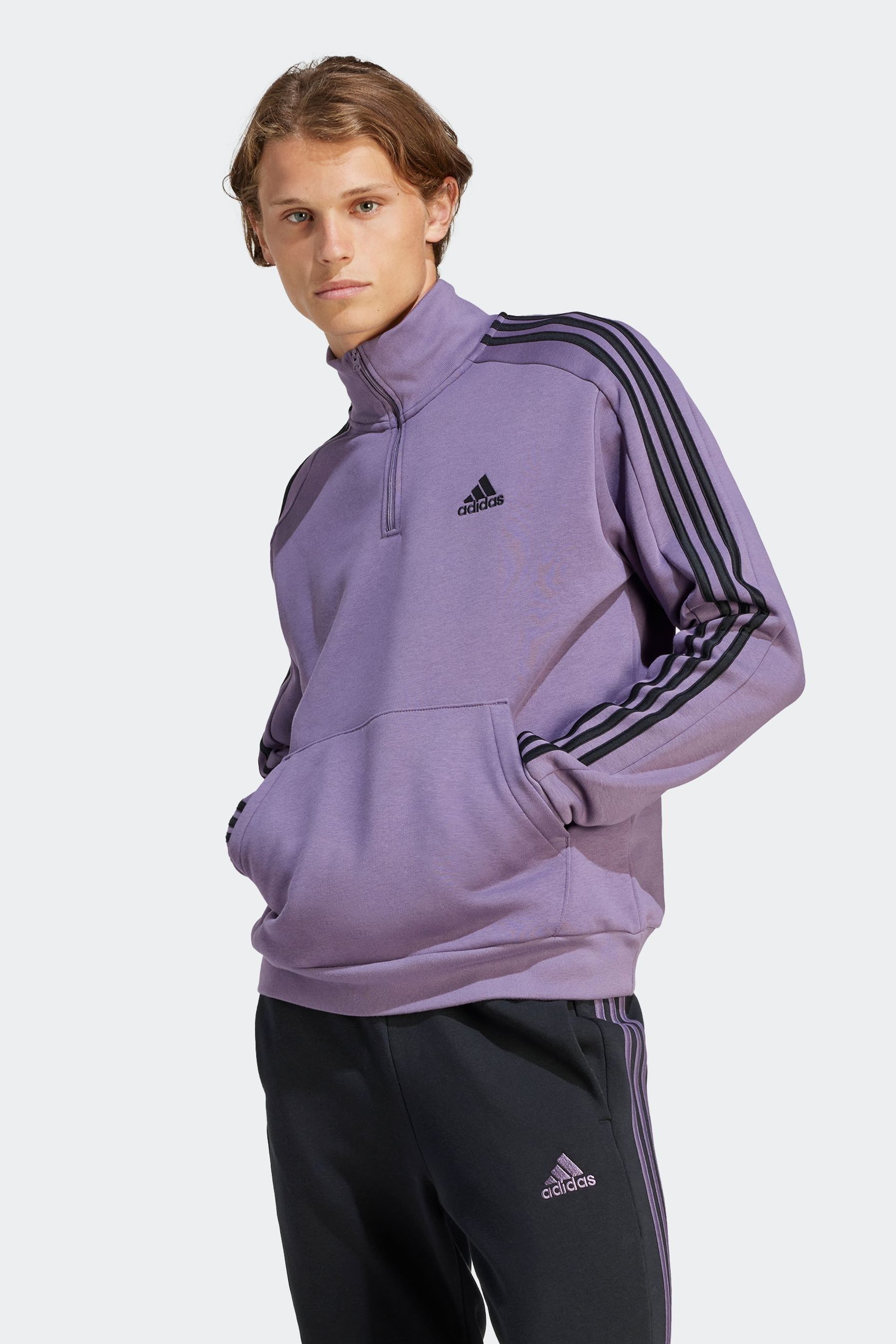 Buy adidas Purple Sportswear Essentials Fleece 3 Stripes 1 4 Zip Sweatshirt from Next Luxembourg