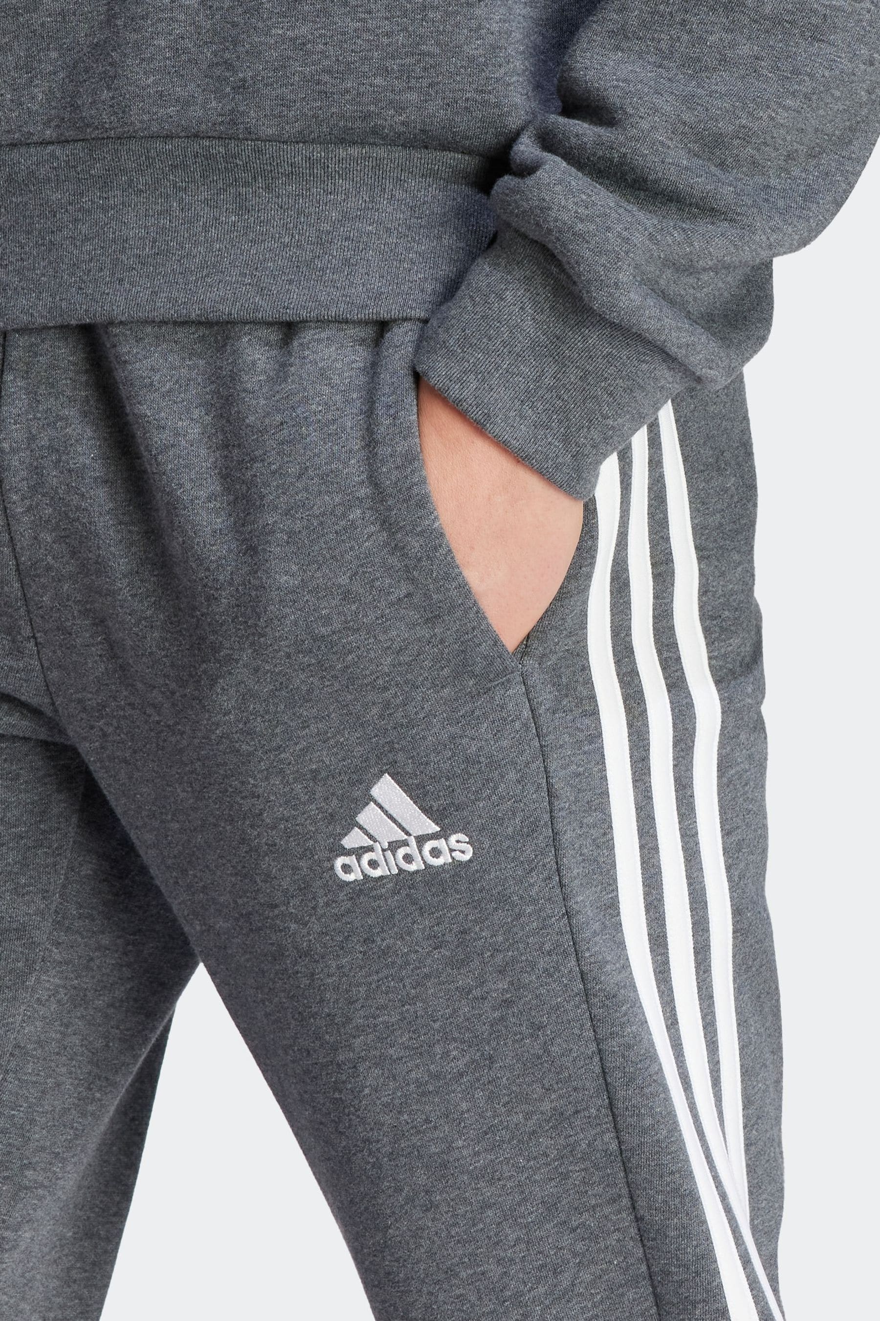 Adidas originals joggers with outline 3 stripes in grey clearance