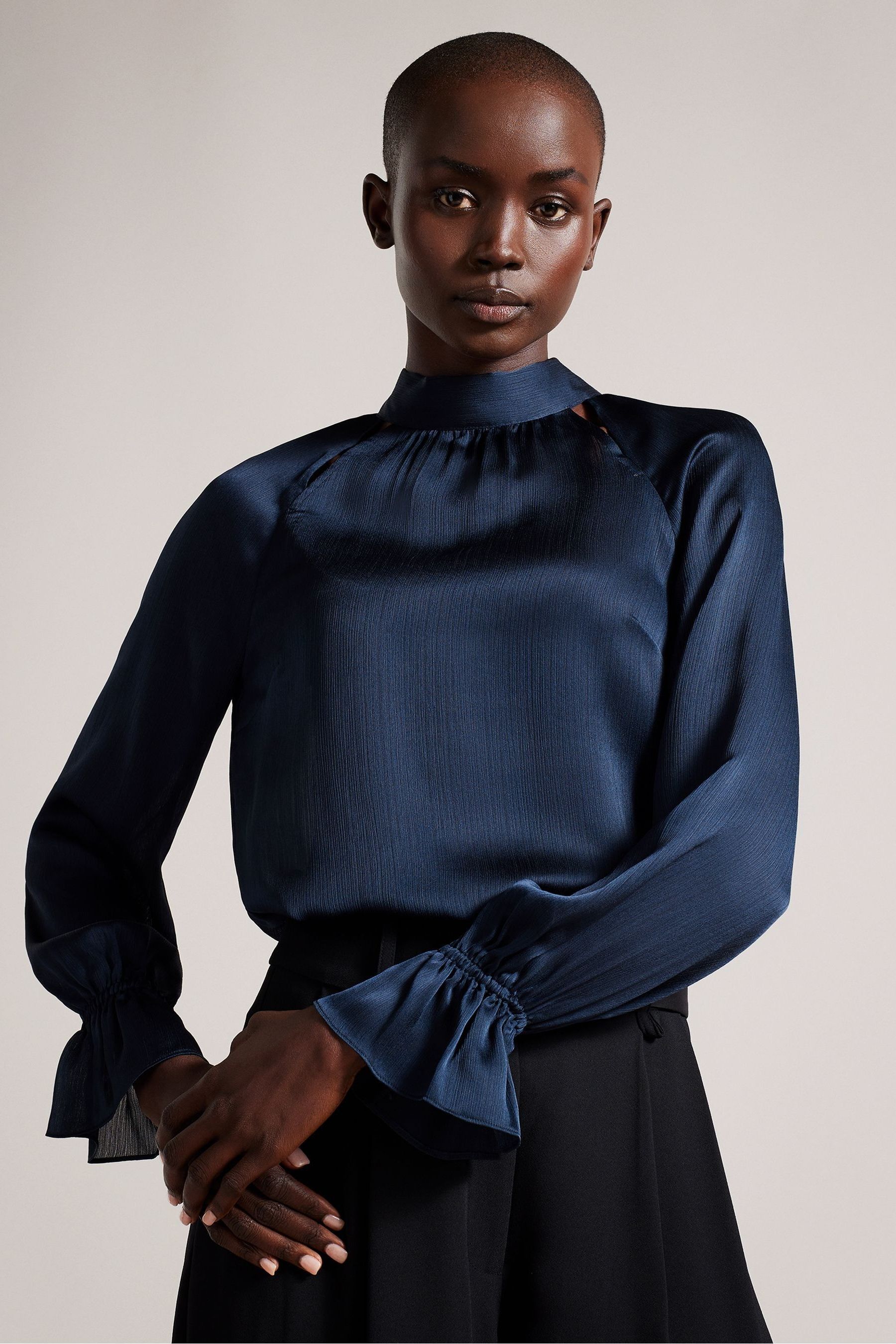 Buy Ted Baker Blue Joanha High Neck Long Sleeve Blouse With Cut Out from Next Austria