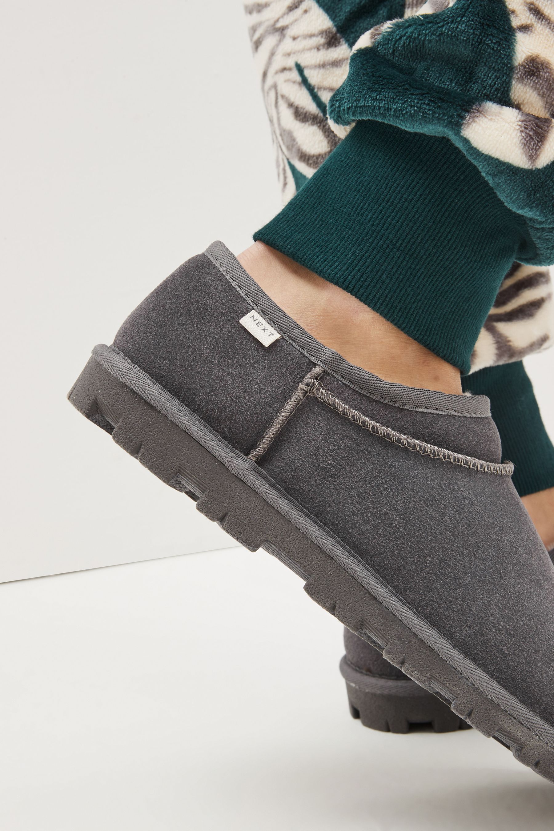 Buy Grey Suede Faux Fur Lined Shoot Slippers from the Next UK online shop