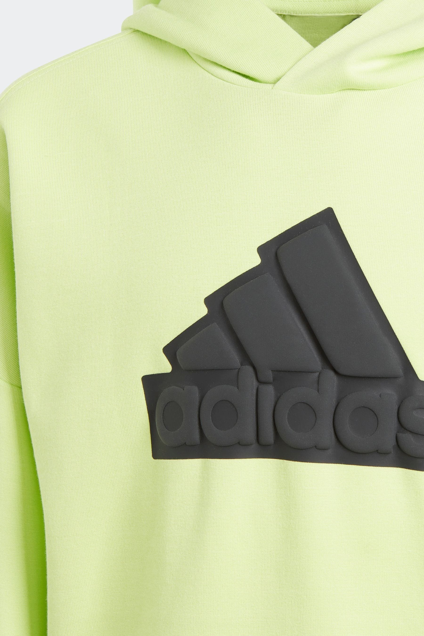 Green adidas hoodie with yellow logo clearance
