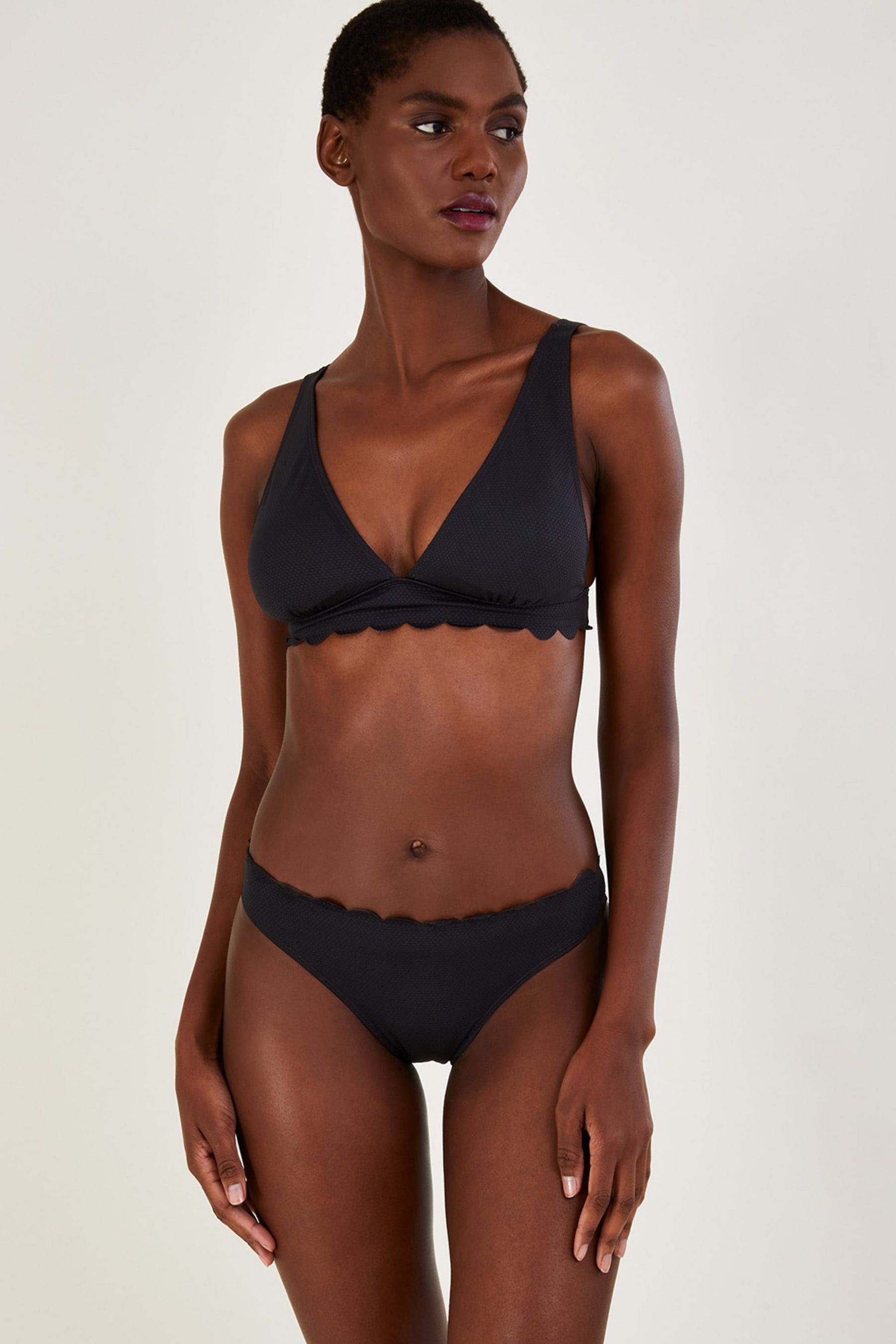 Buy Monsoon Scallop Edge Plain Black Bikini Bottoms With Recycled Polyester from Next Luxembourg