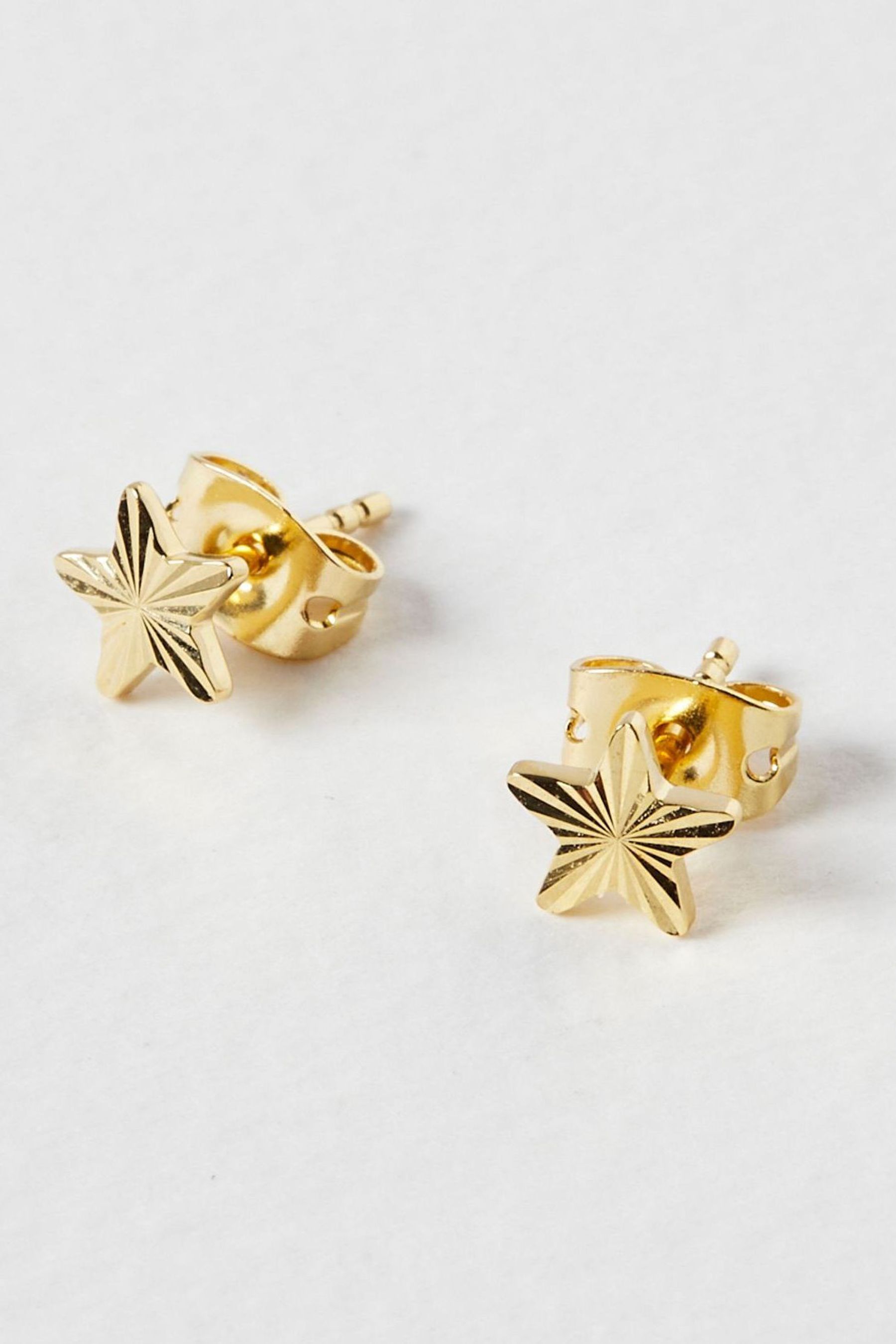 Buy Oliver Bonas Gold Plated Fay Machine Etched Star Stud Earrings from the Next UK online shop