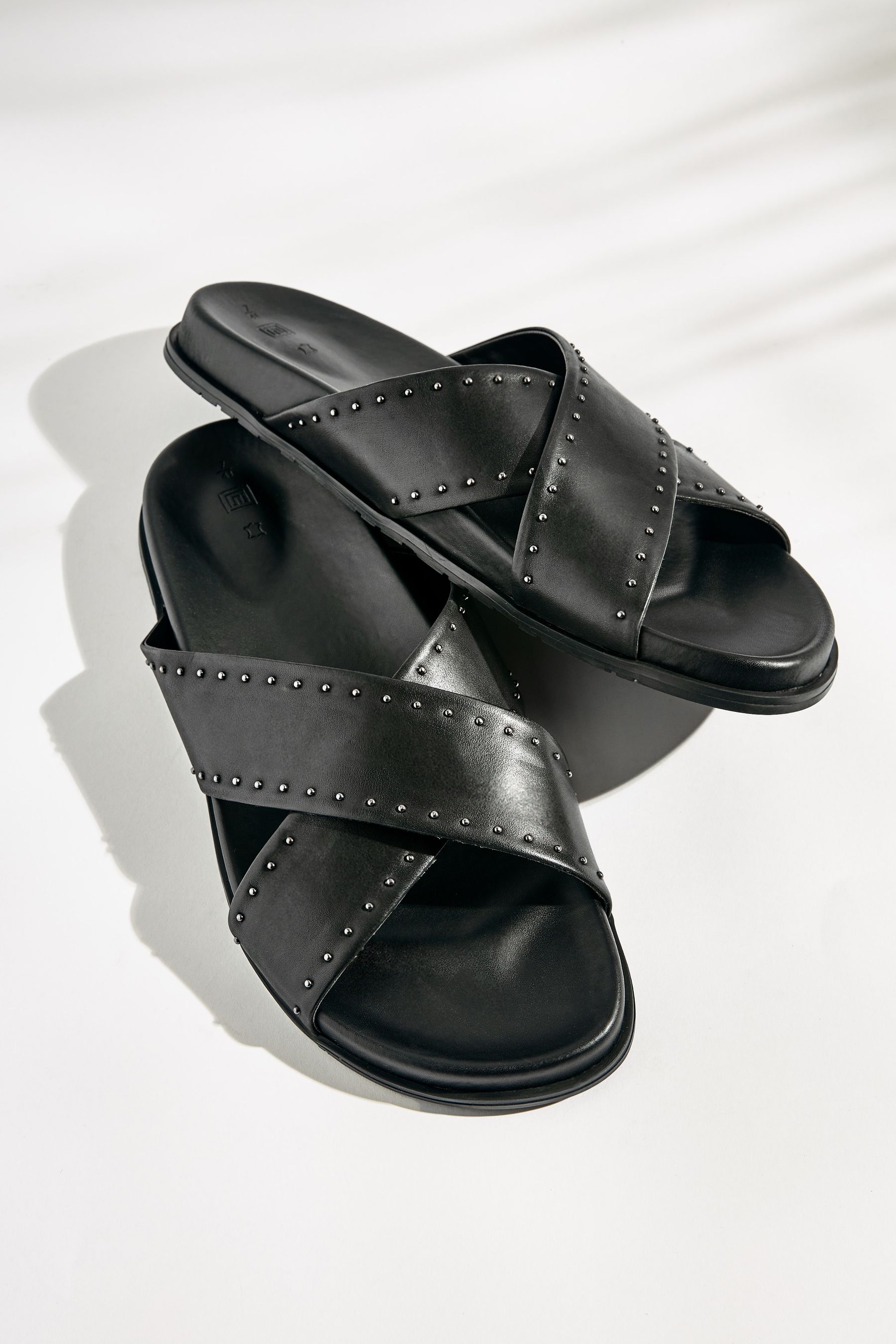 Buy Black Leather Flat Footbed Sandals with Stud Detailing from Next Luxembourg
