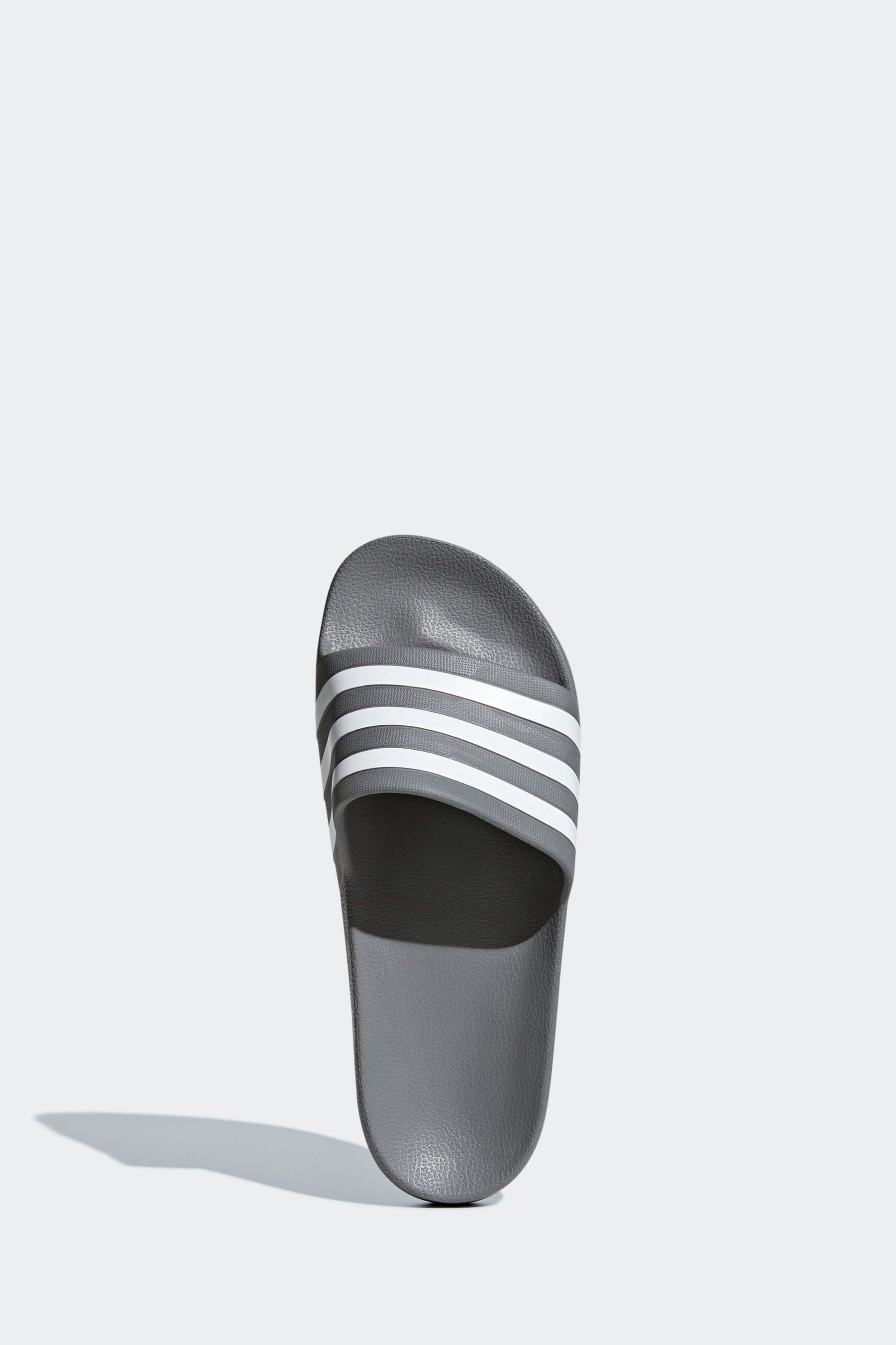 Grey adidas slides hotsell