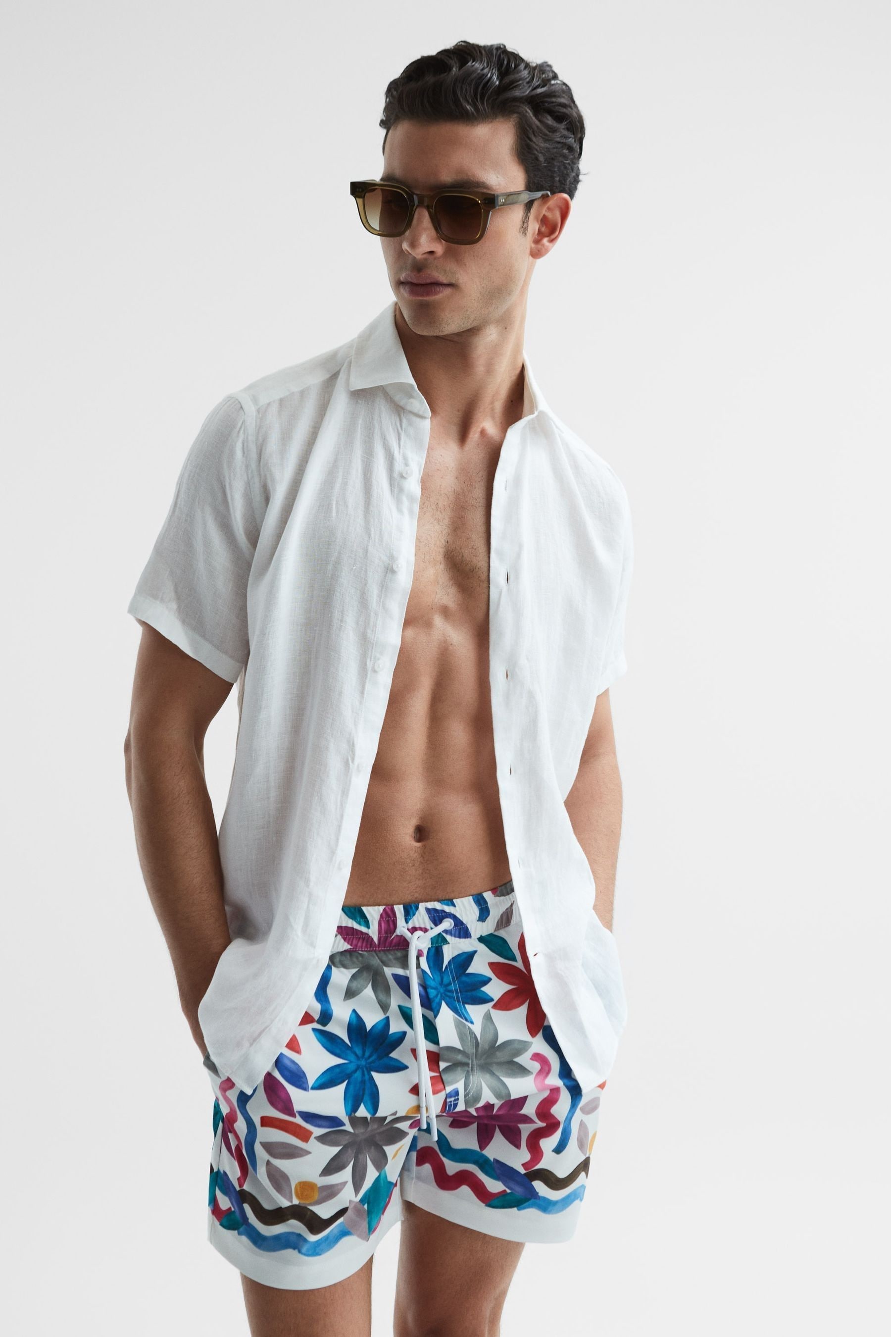 Buy Reiss Multi Arizona Floral Print Drawstring Swim Shorts from the Next UK online shop