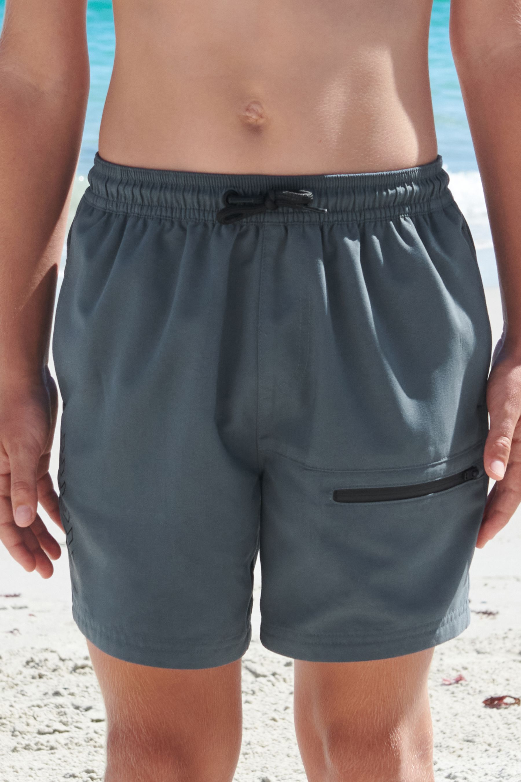 Swim shorts with zip pockets uk online