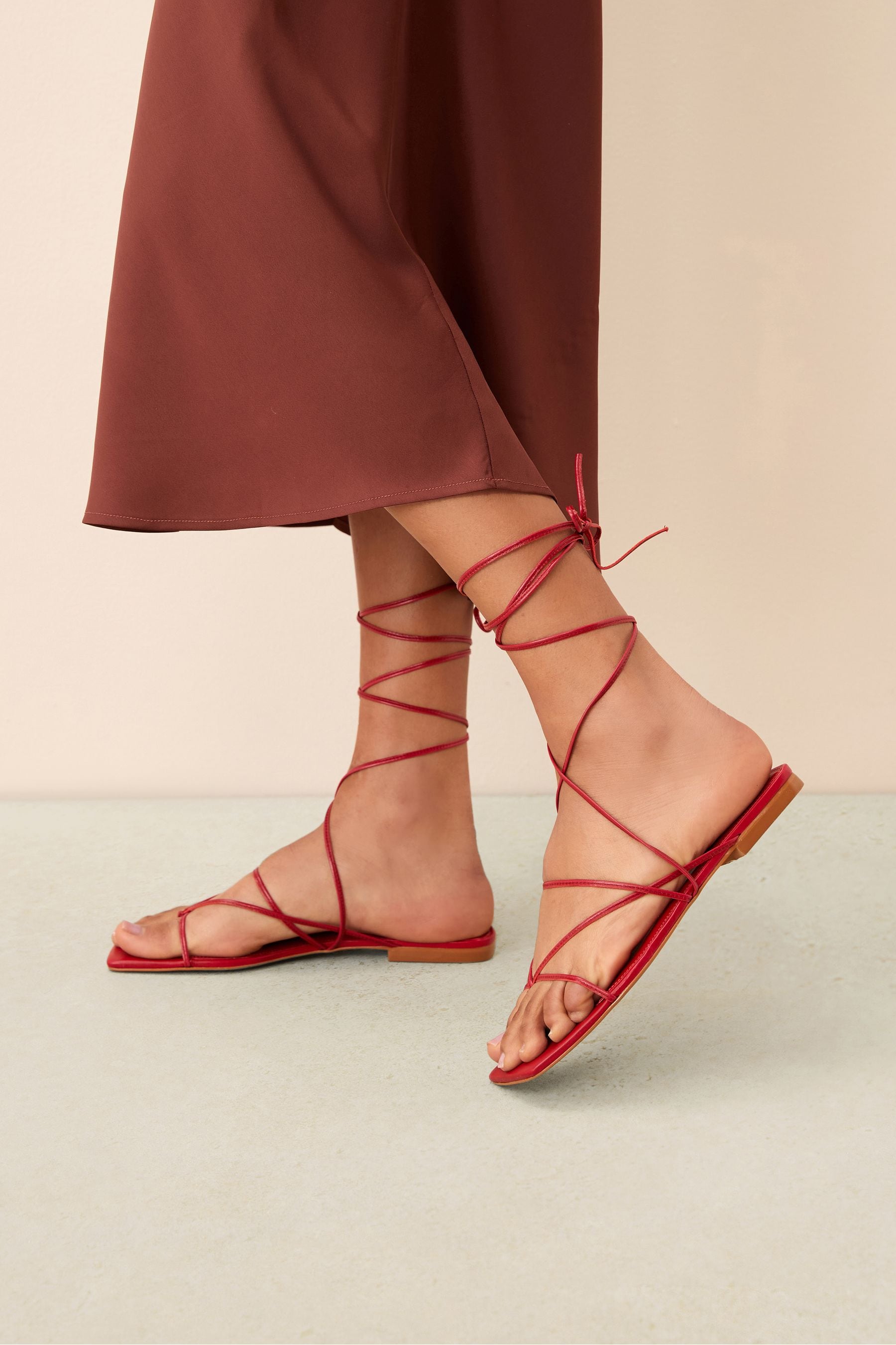 Buy Red Signature Leather Ankle Wrap Flat Sandals from Next Luxembourg