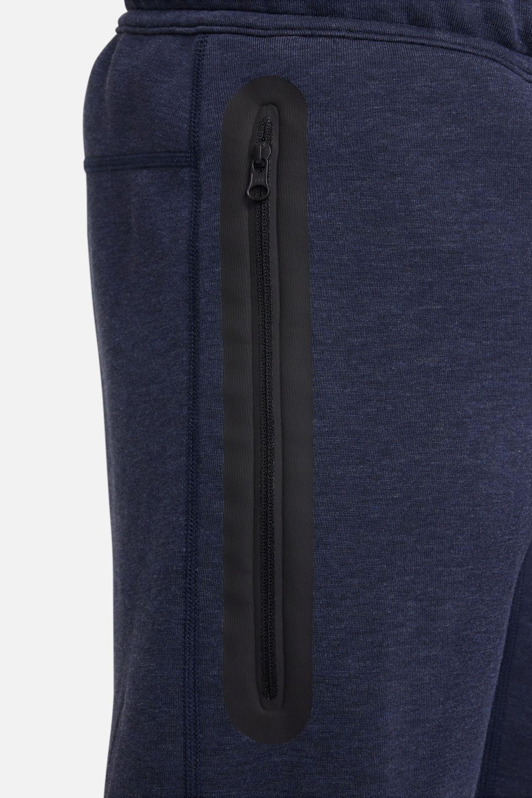 Dark blue nike joggers deals