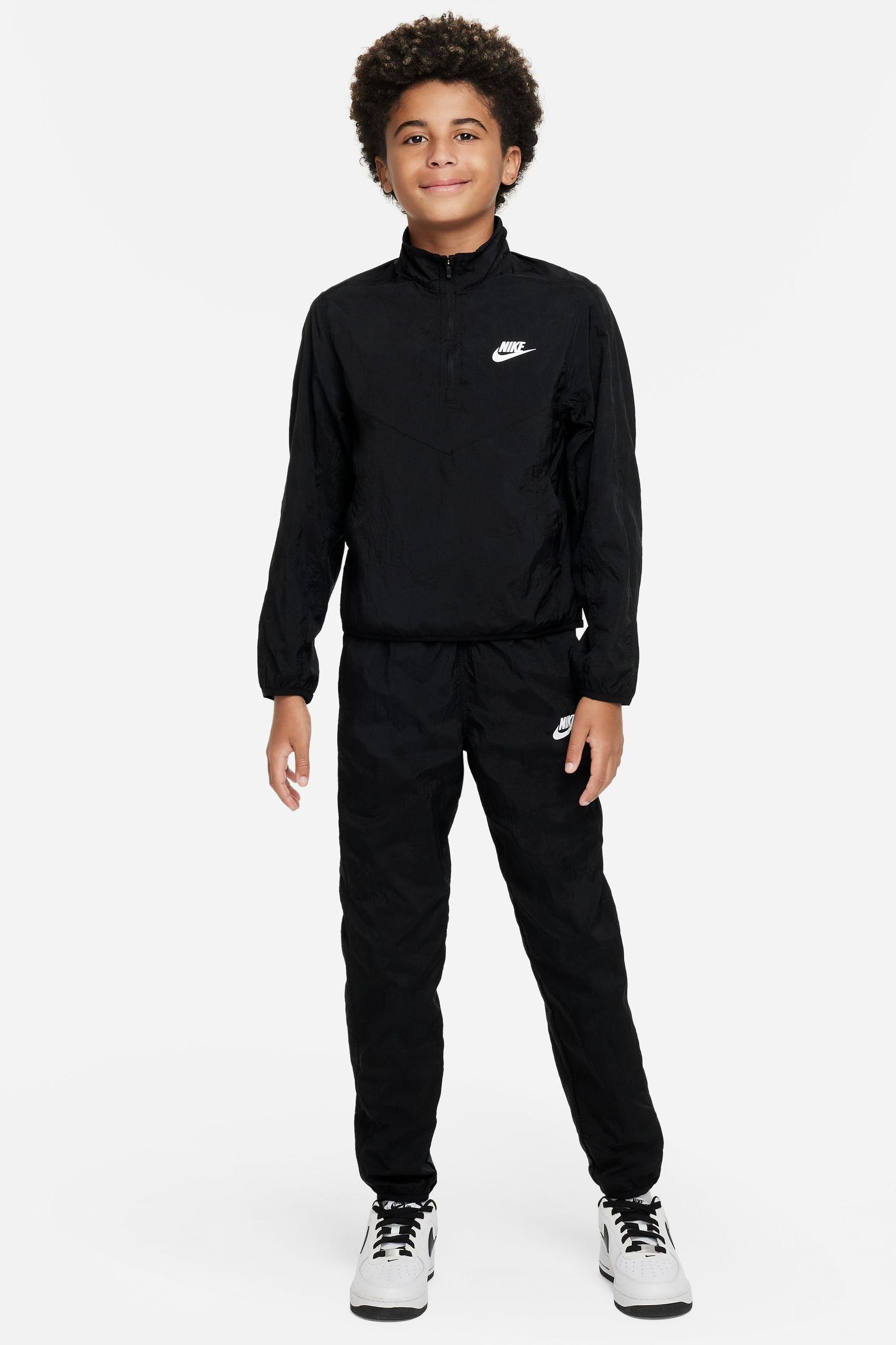 Buy Nike Black Zip Top Woven Tracksuit from Next Ireland