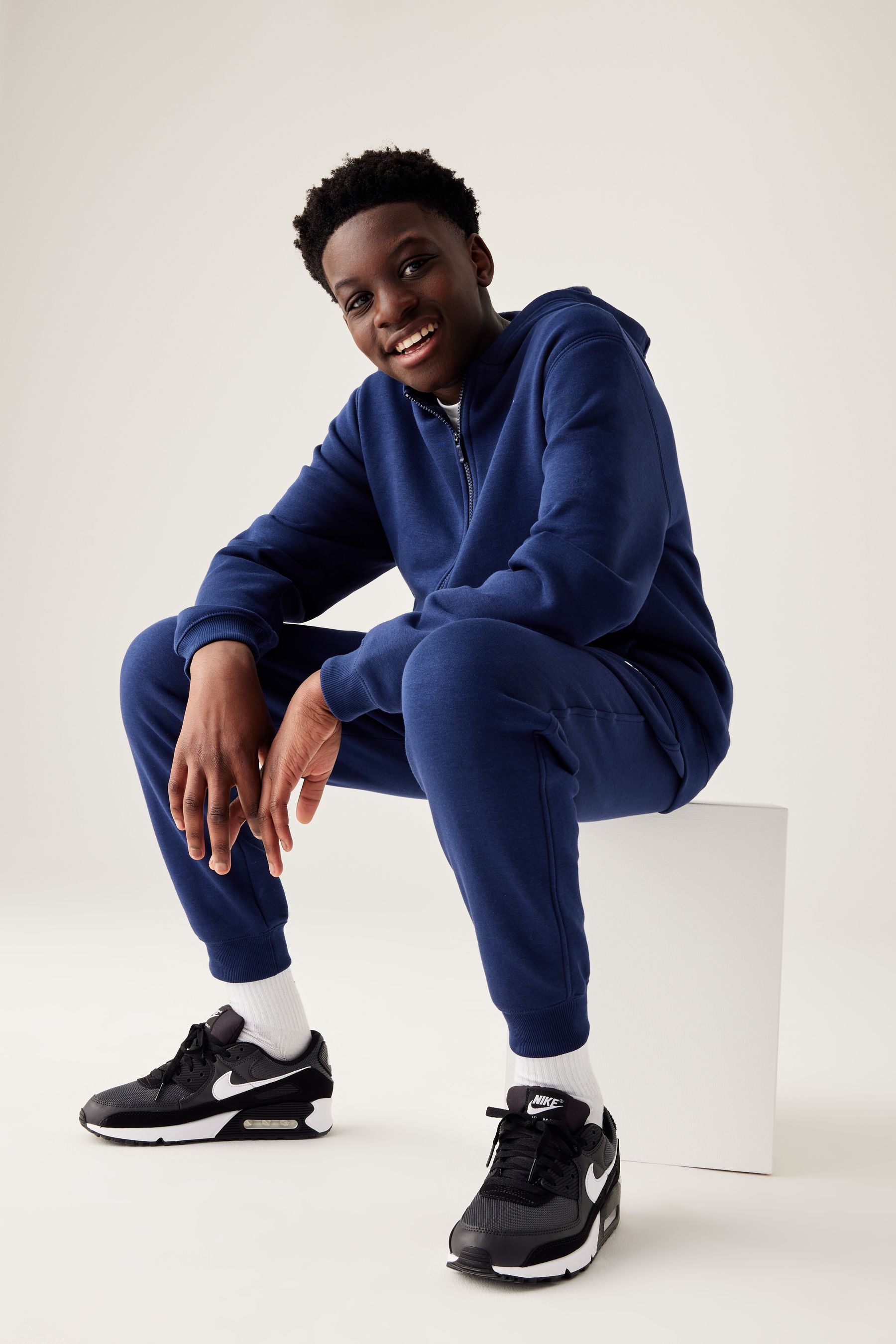 Nike fleece tracksuit navy online