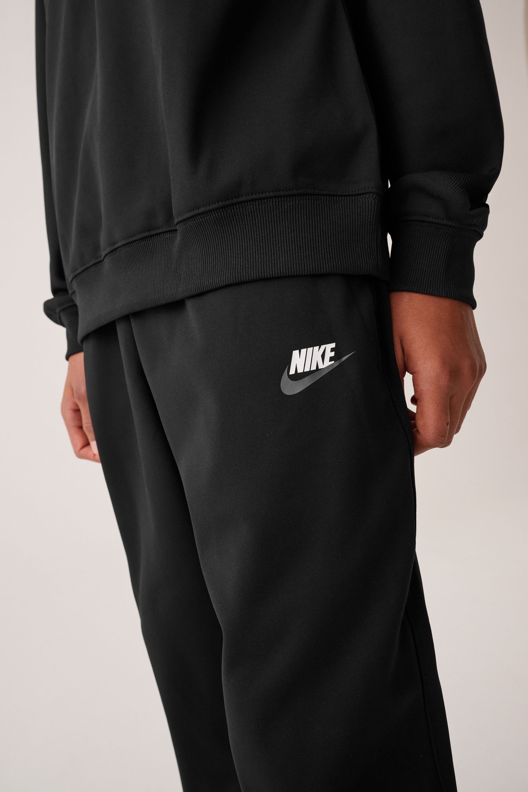 Black nike trackies discount