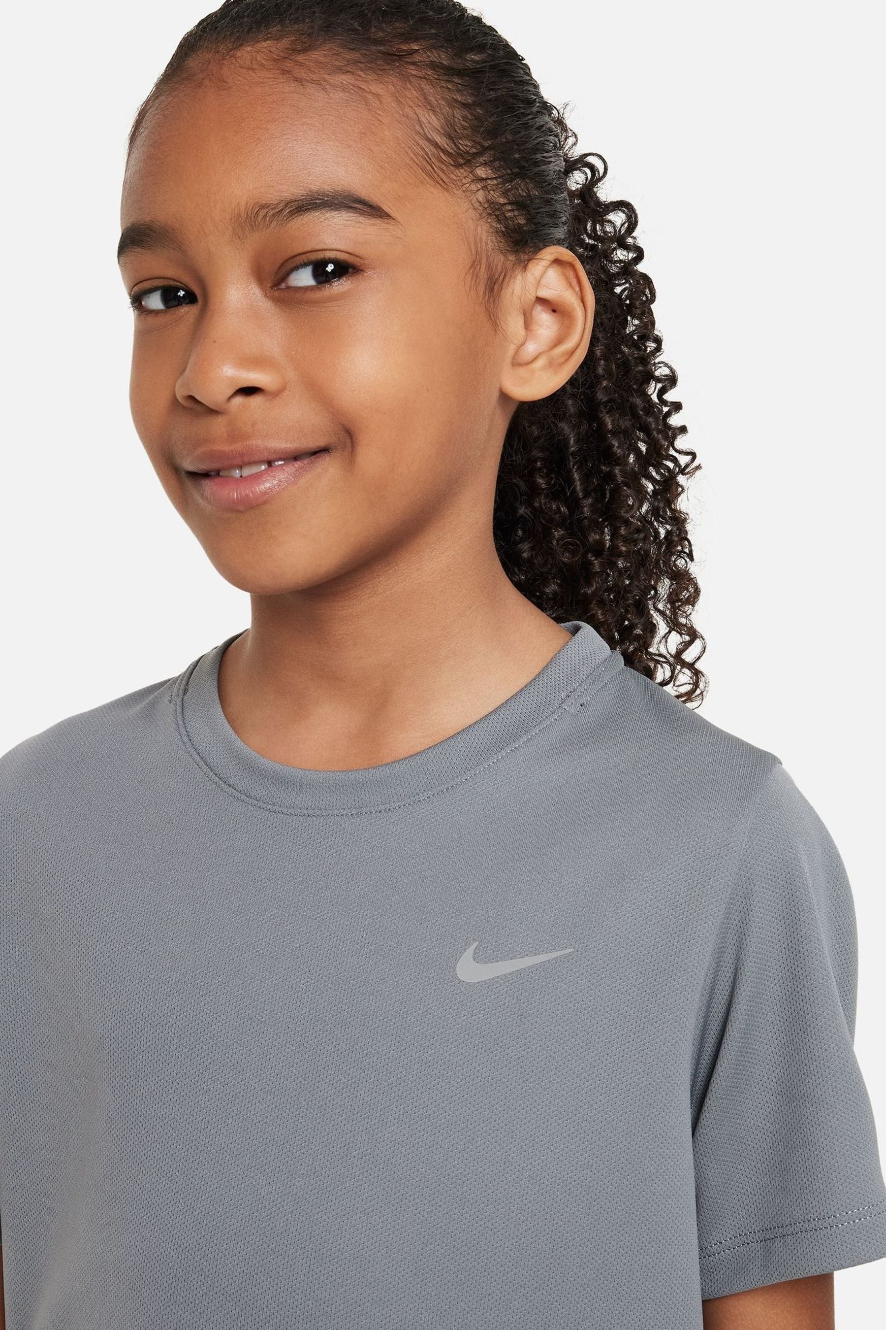 Buy Nike Cool Grey Dri FIT Miler T Shirt from the Next UK online shop