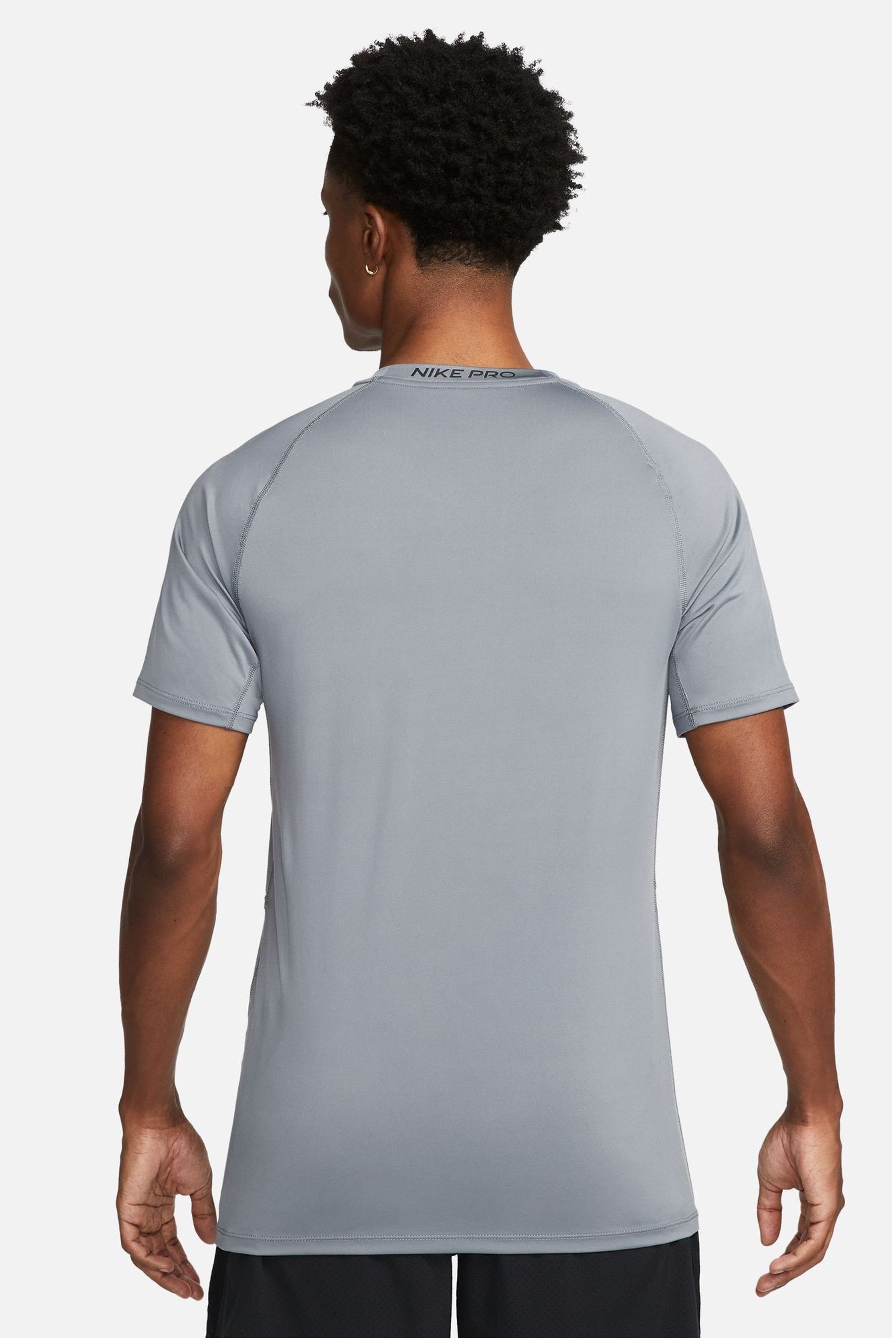 Buy Nike Smoke Grey Pro Dri FIT Slim Fit T Shirt from Next Luxembourg