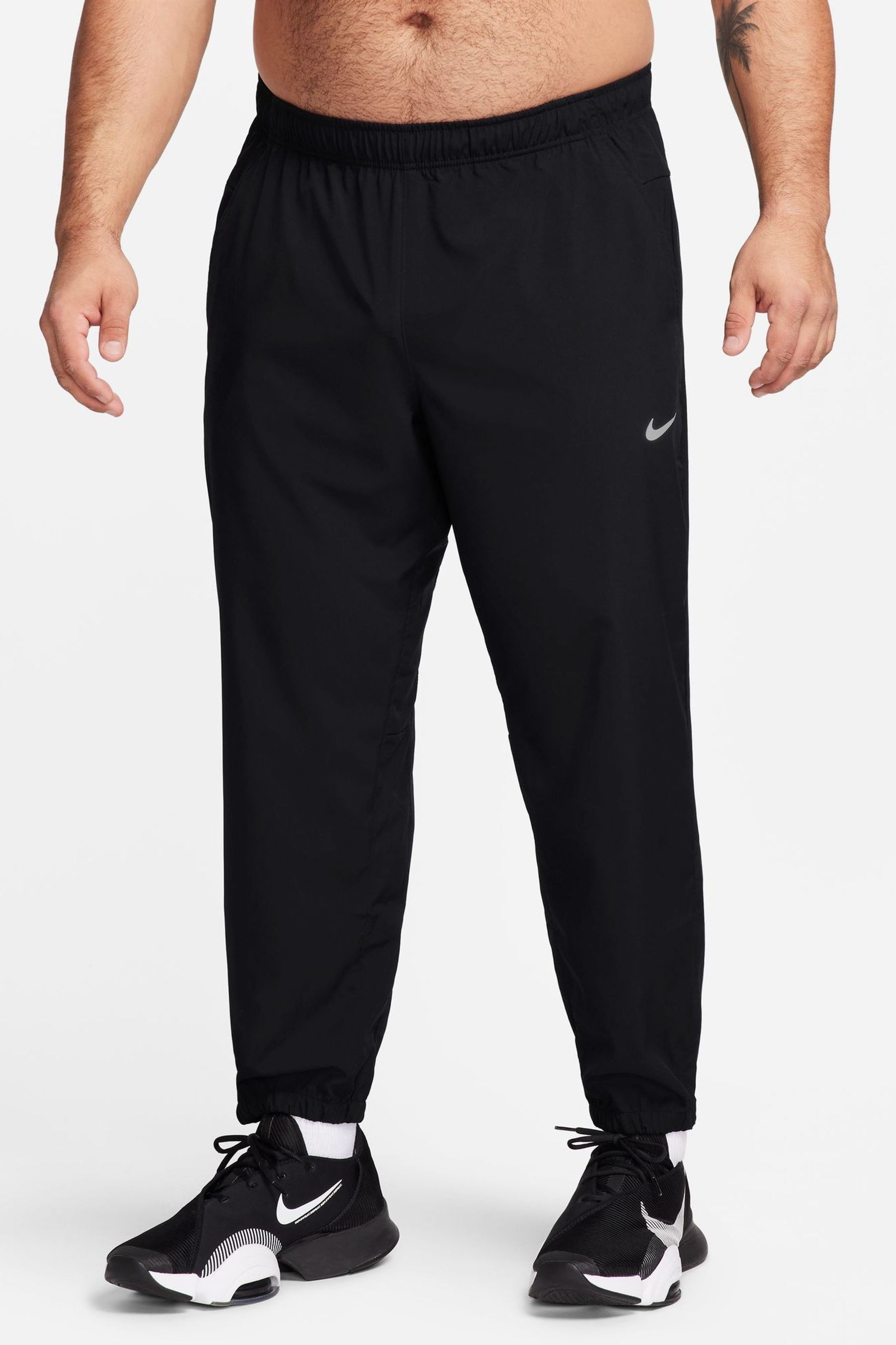 Nike black tapered joggers sale