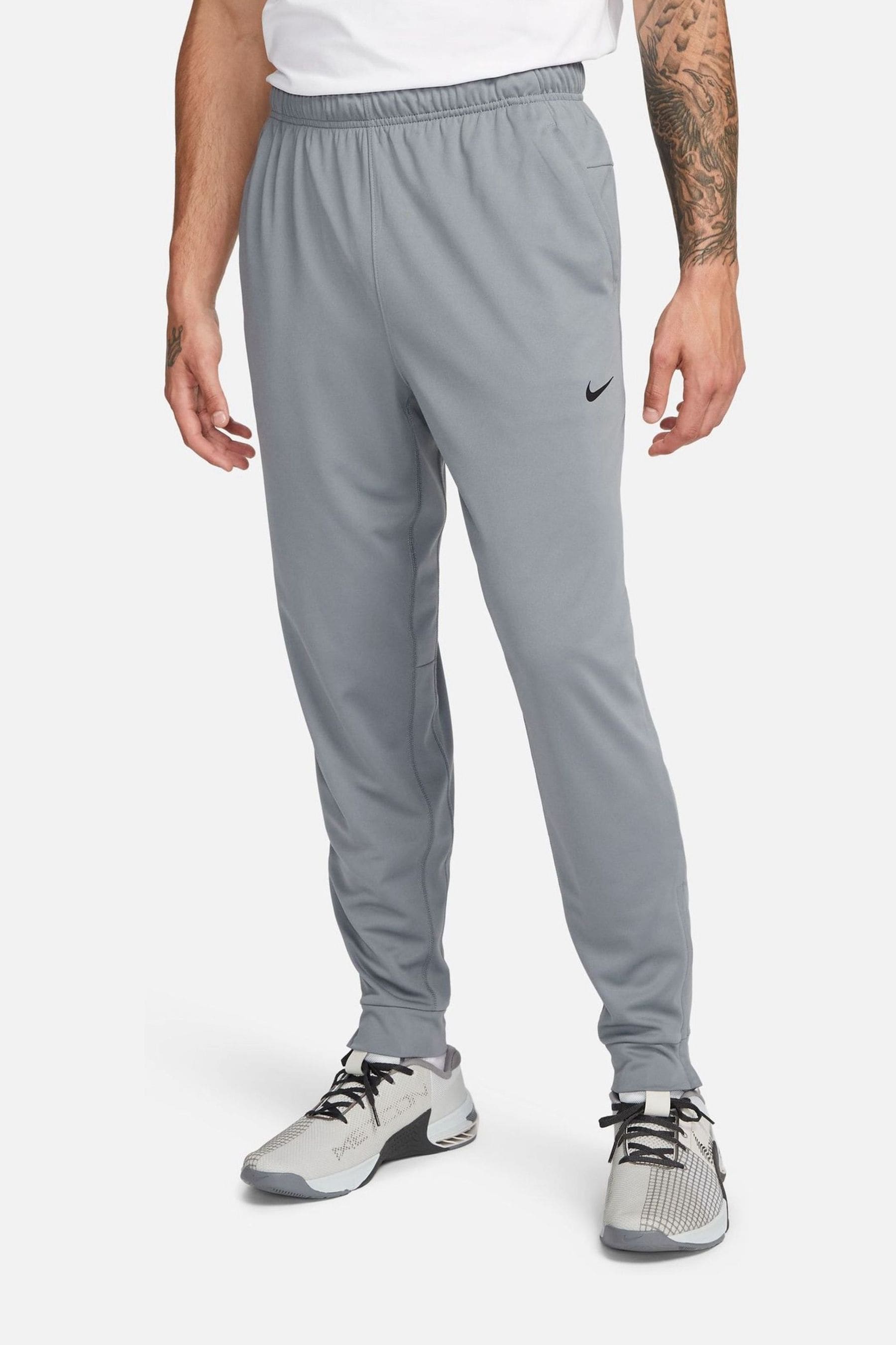 Nike training tapered joggers grey sale