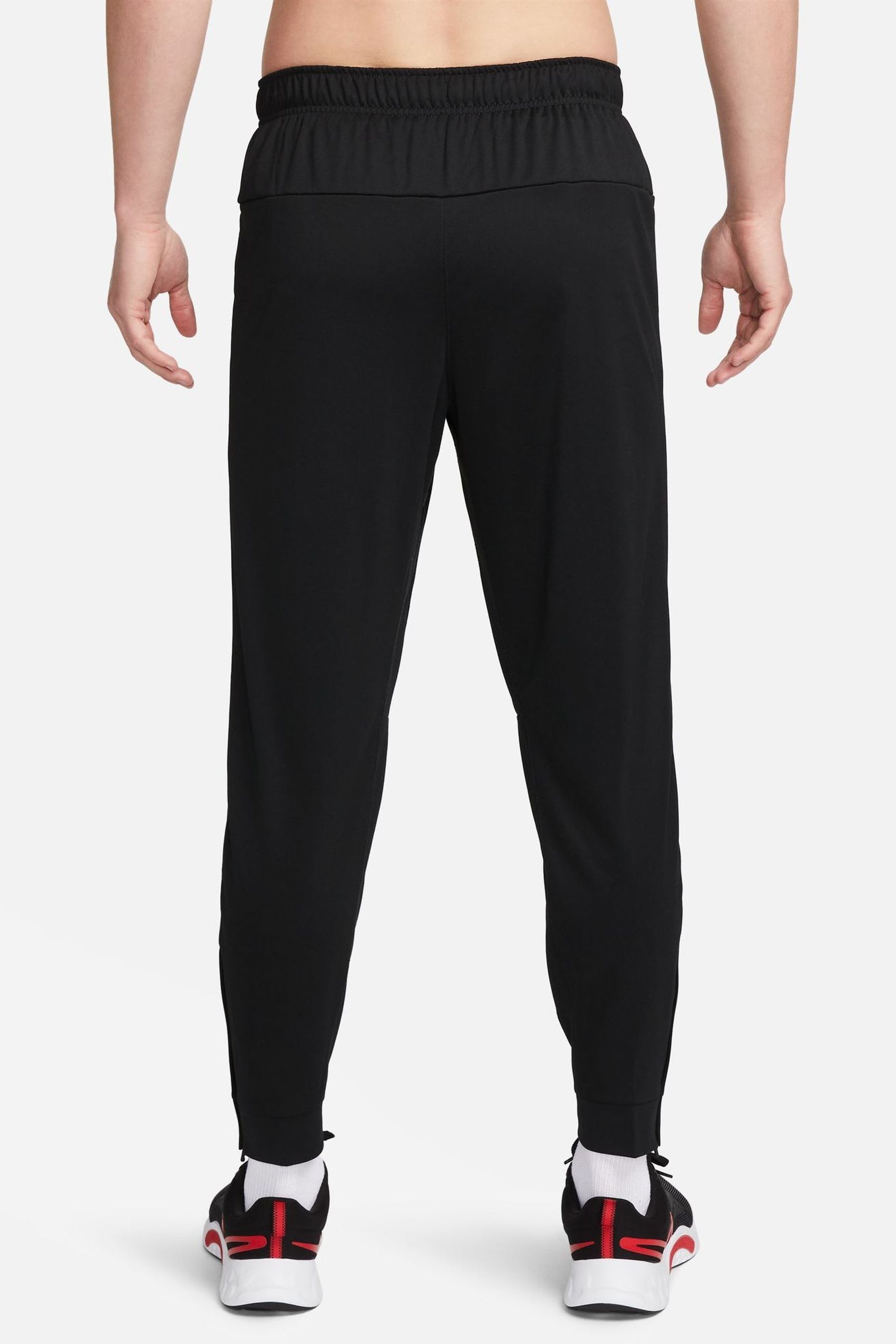 Nike black essentials slim joggers top