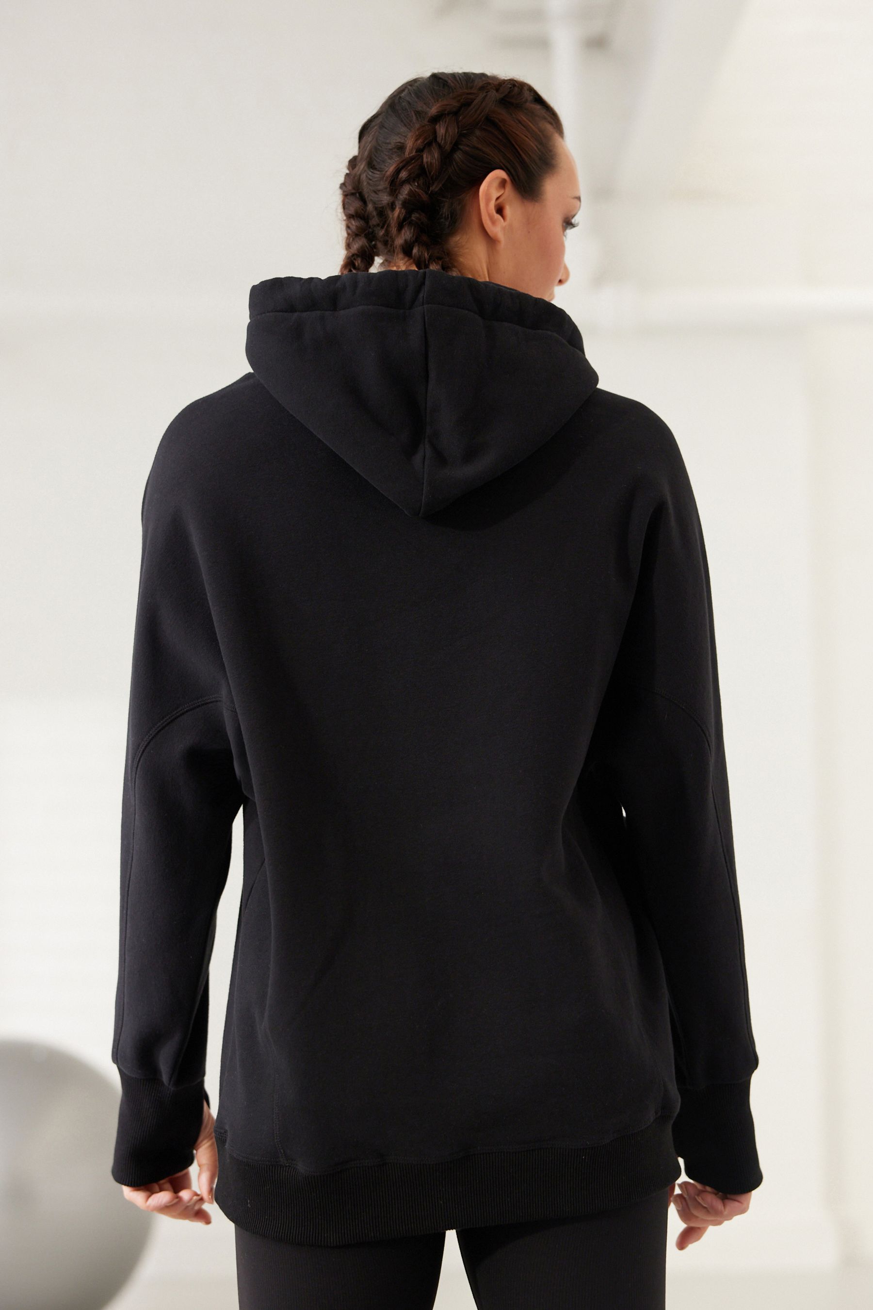 Buy Black Active Longline Overhead Hoodie from Next Estonia