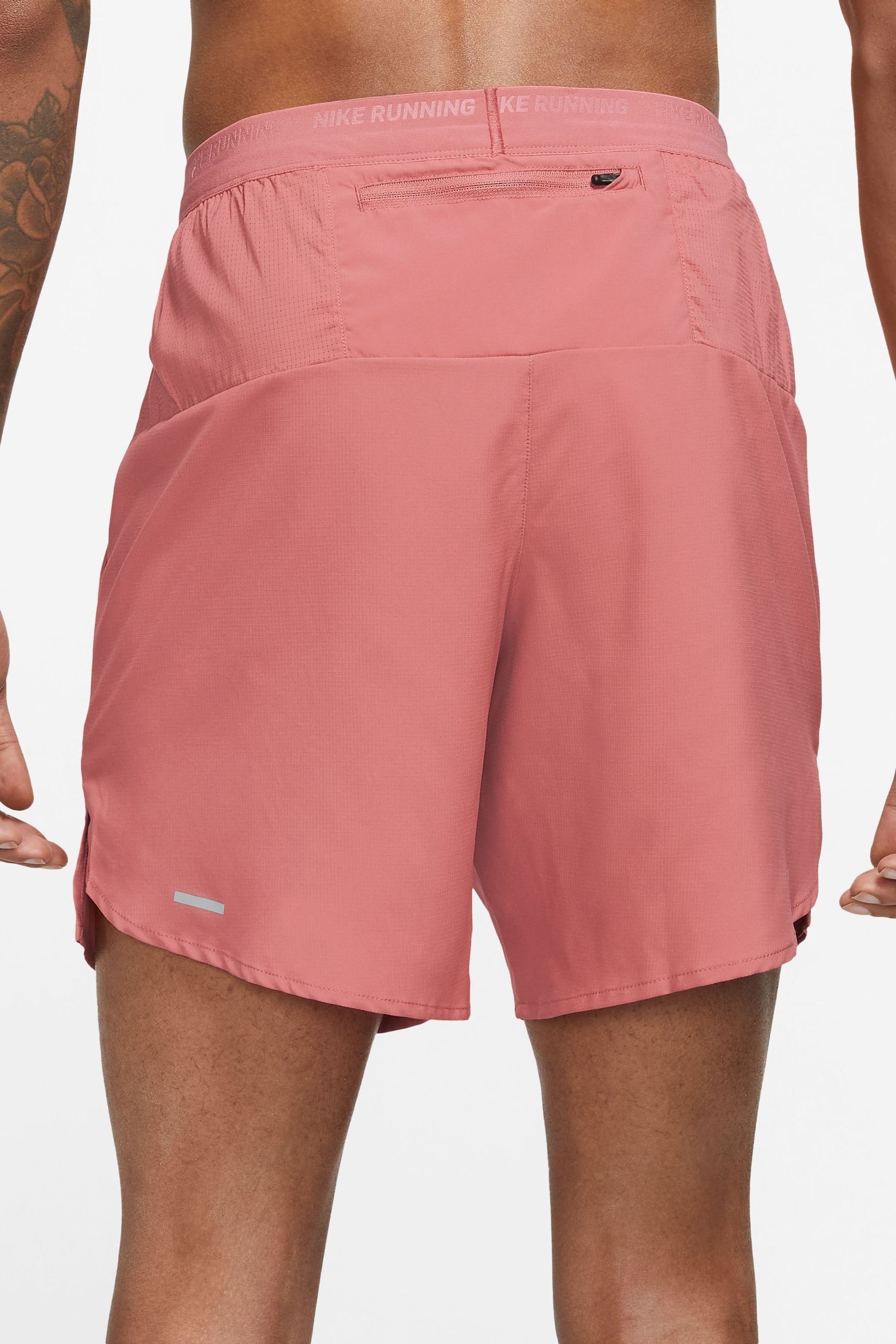 Buy Nike Light Pink Dri FIT Stride 7 Inch Running Shorts from Next Luxembourg