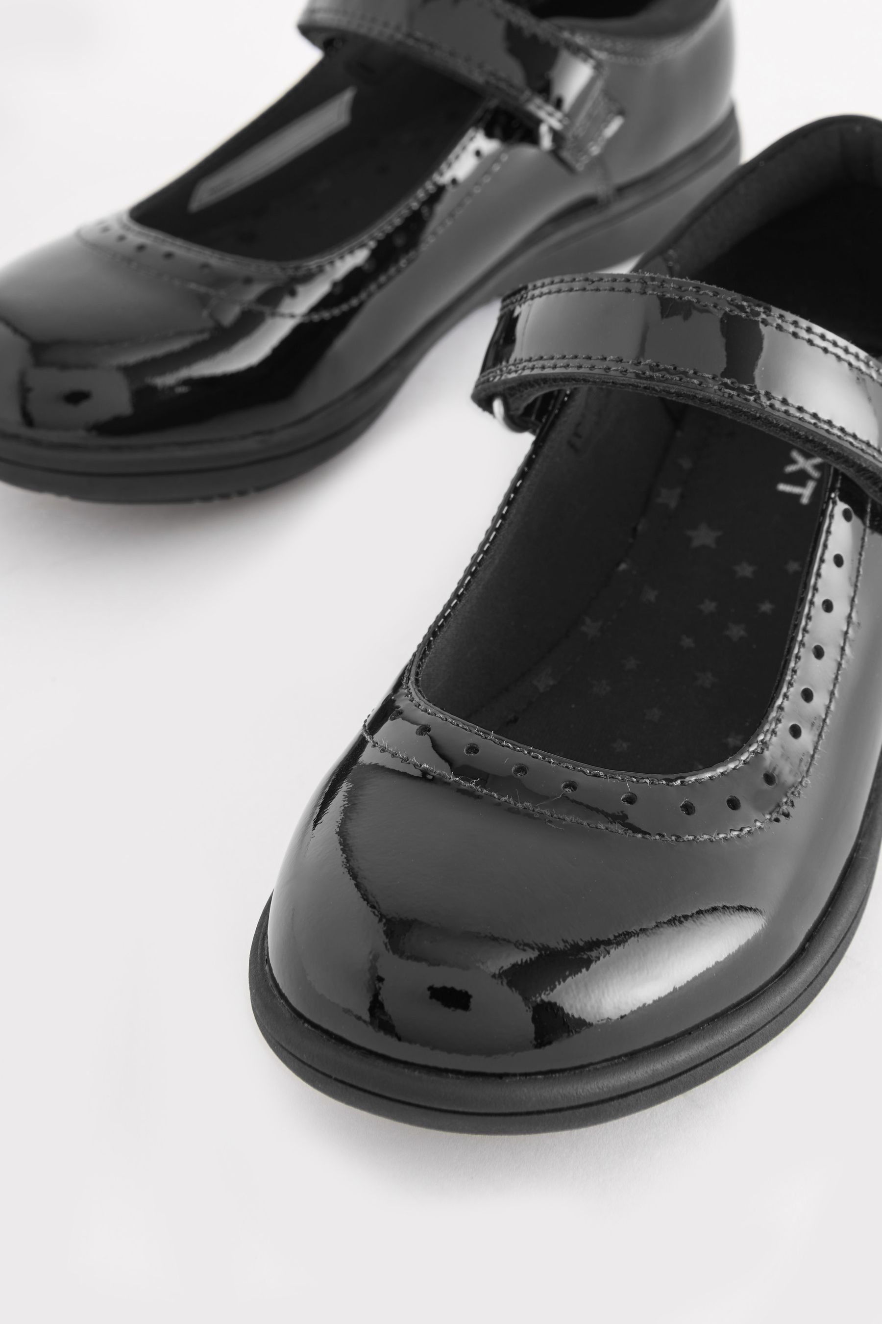 Girls black brogue shoes top