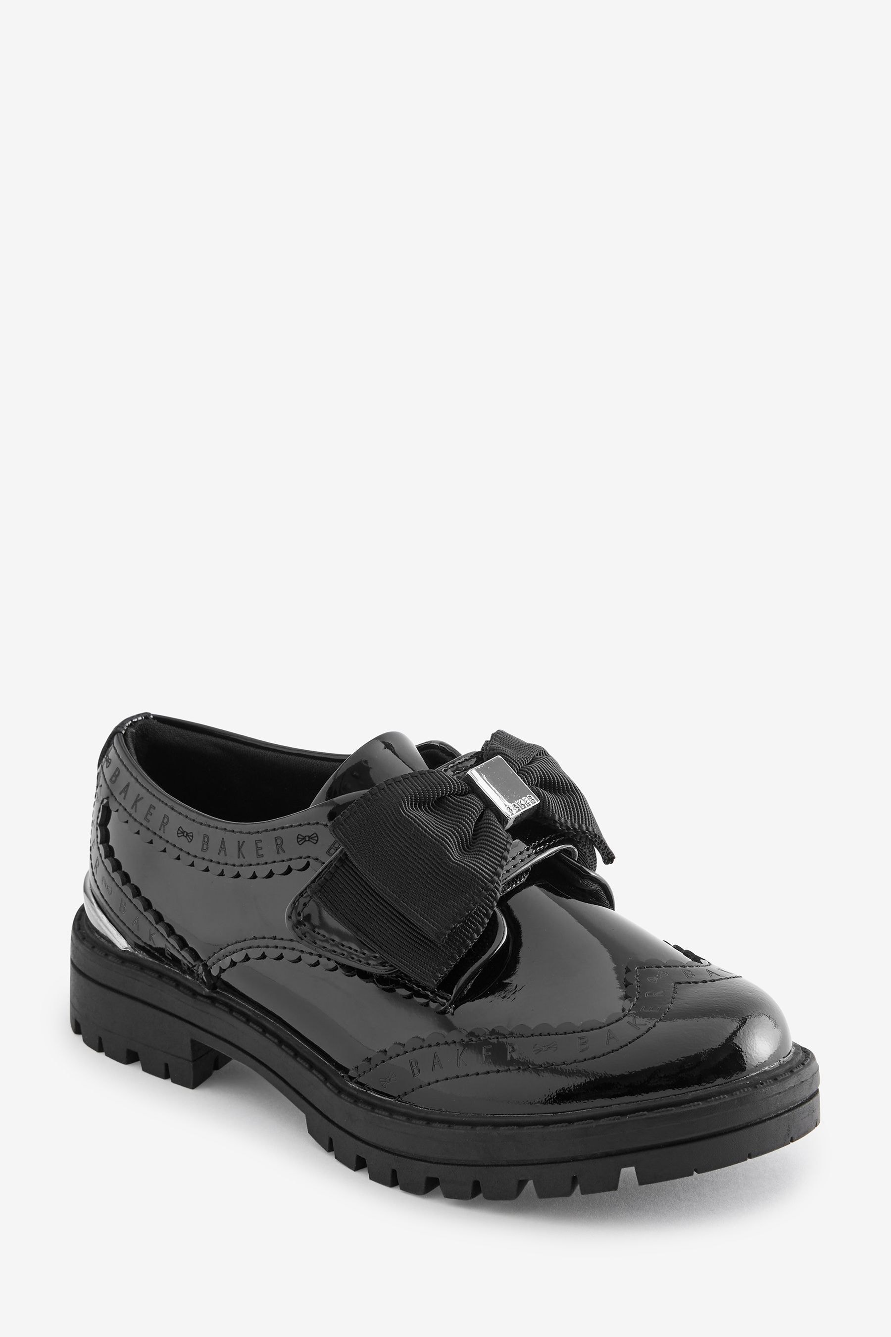 Girls black ted baker shoes top