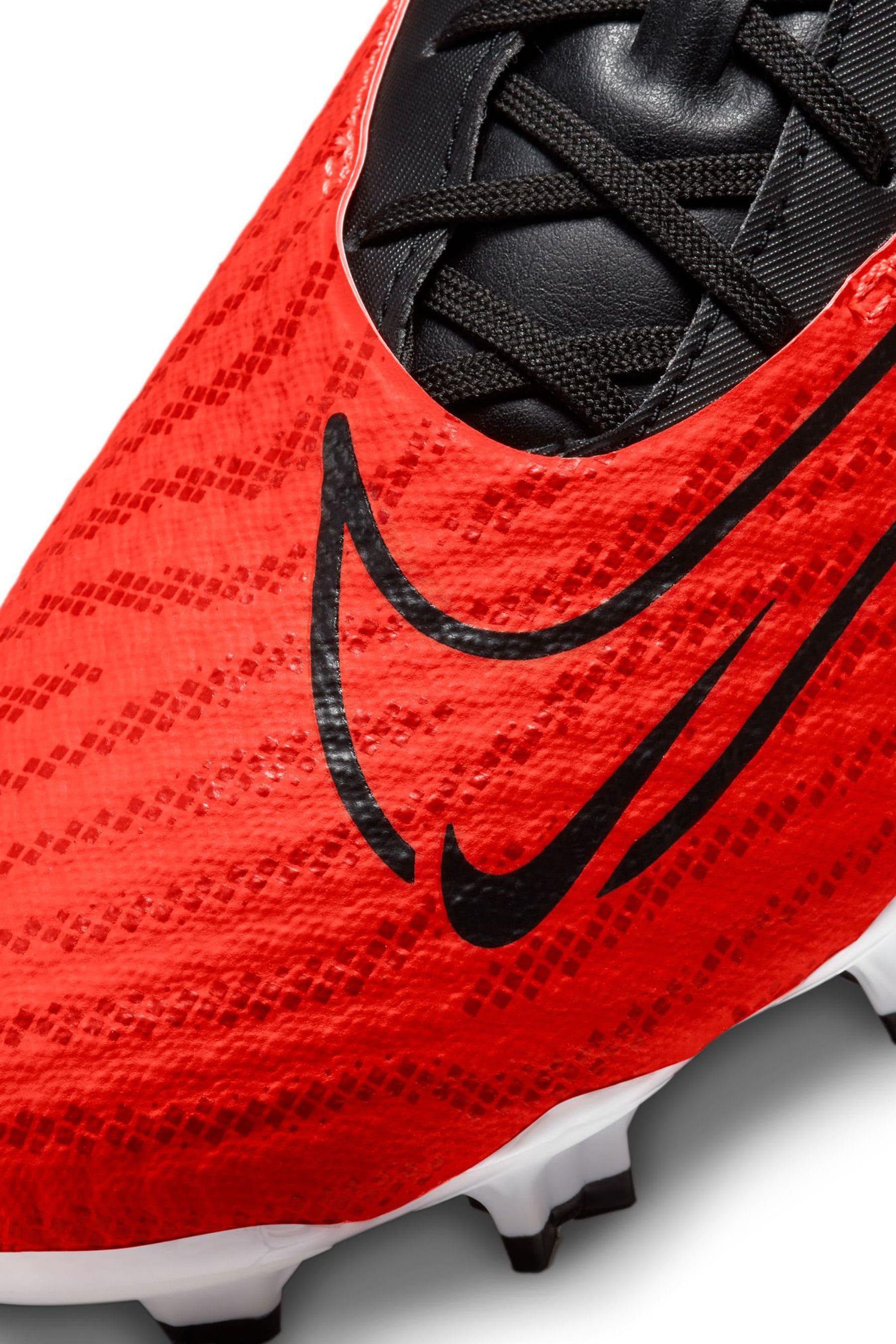 Buy Nike Red Phantom Academy Firm Ground Football Boots from Next Luxembourg