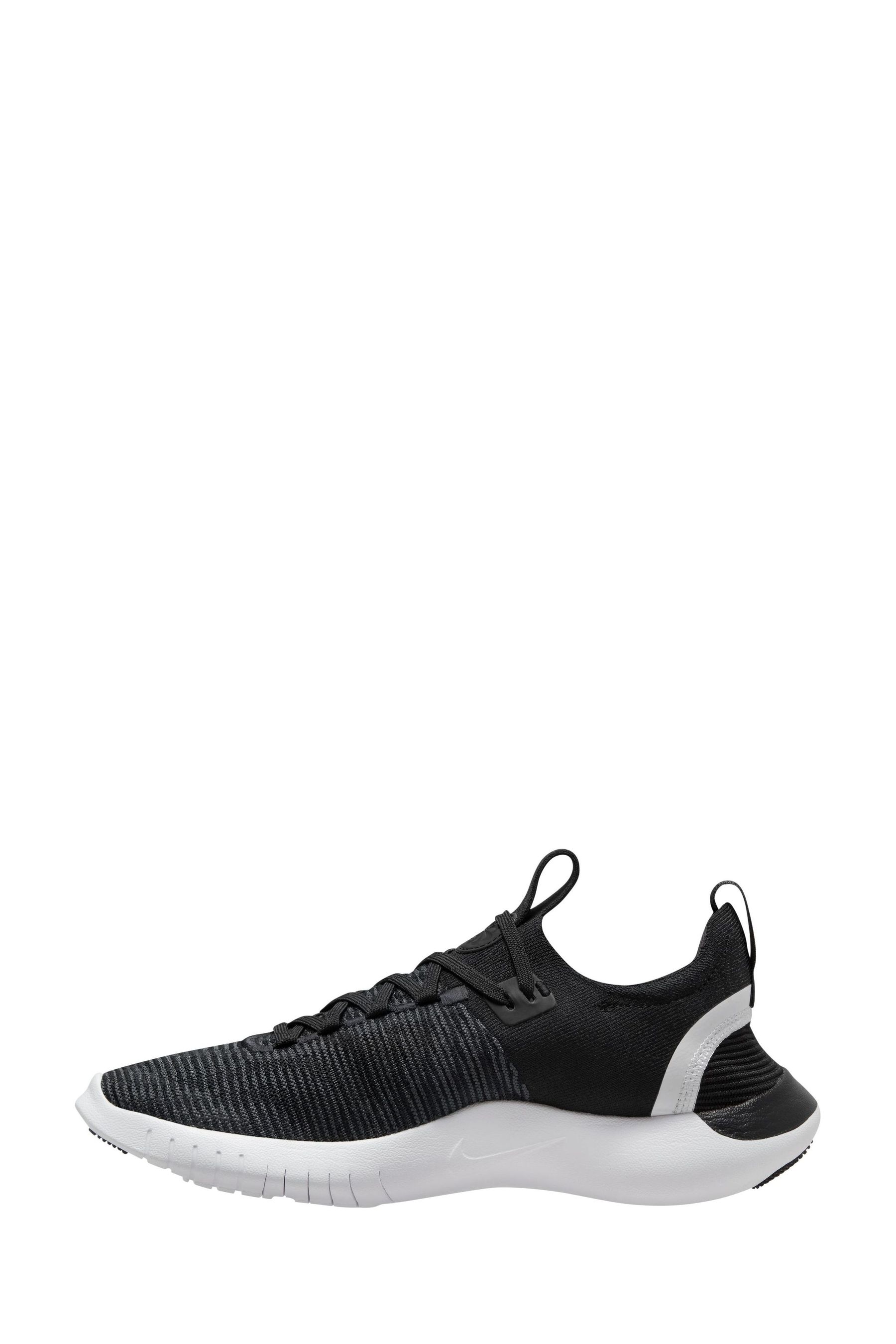 Nike running free run flyknit trainers in black top