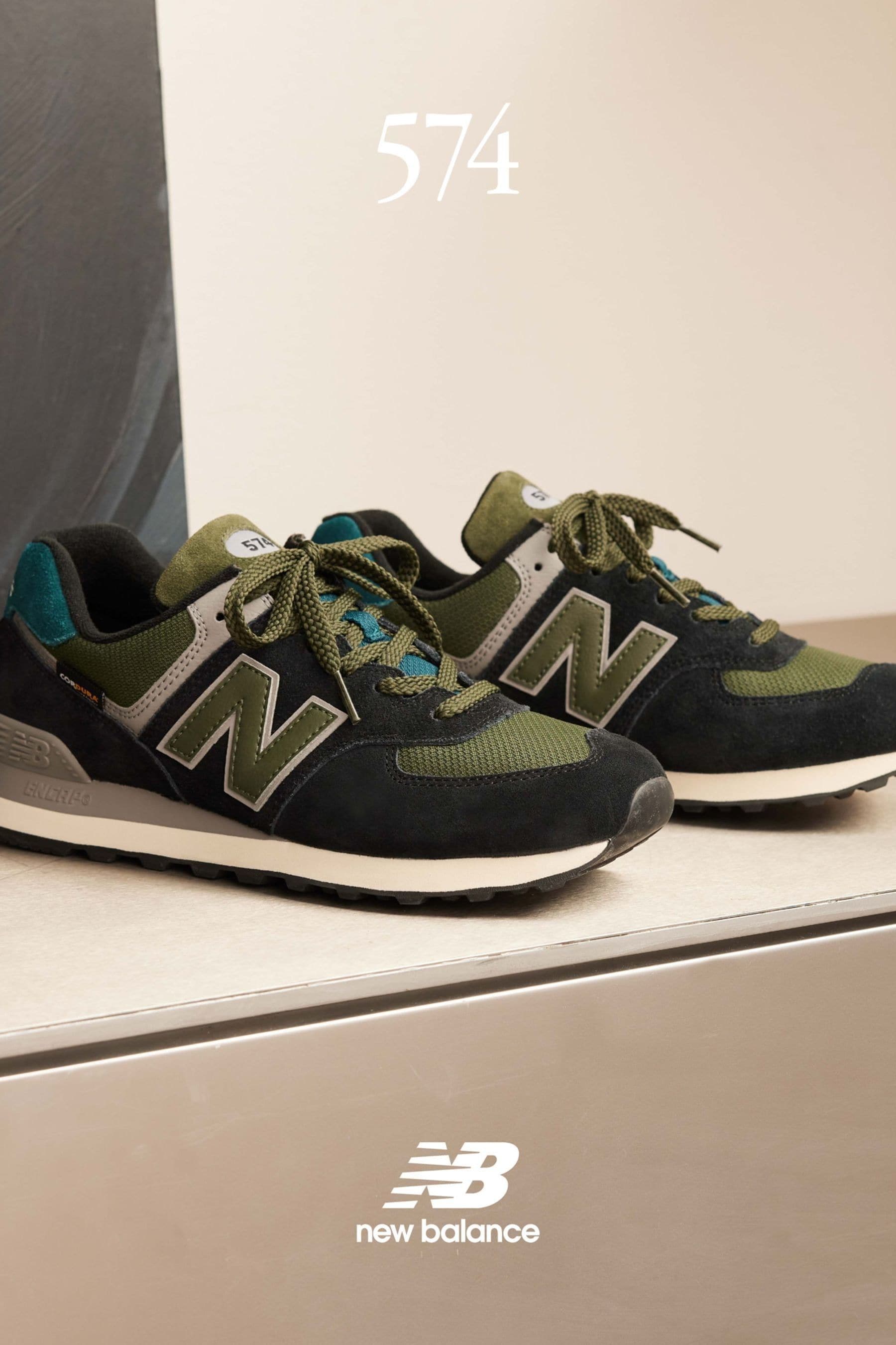 New balance black 574 trainers hot sale