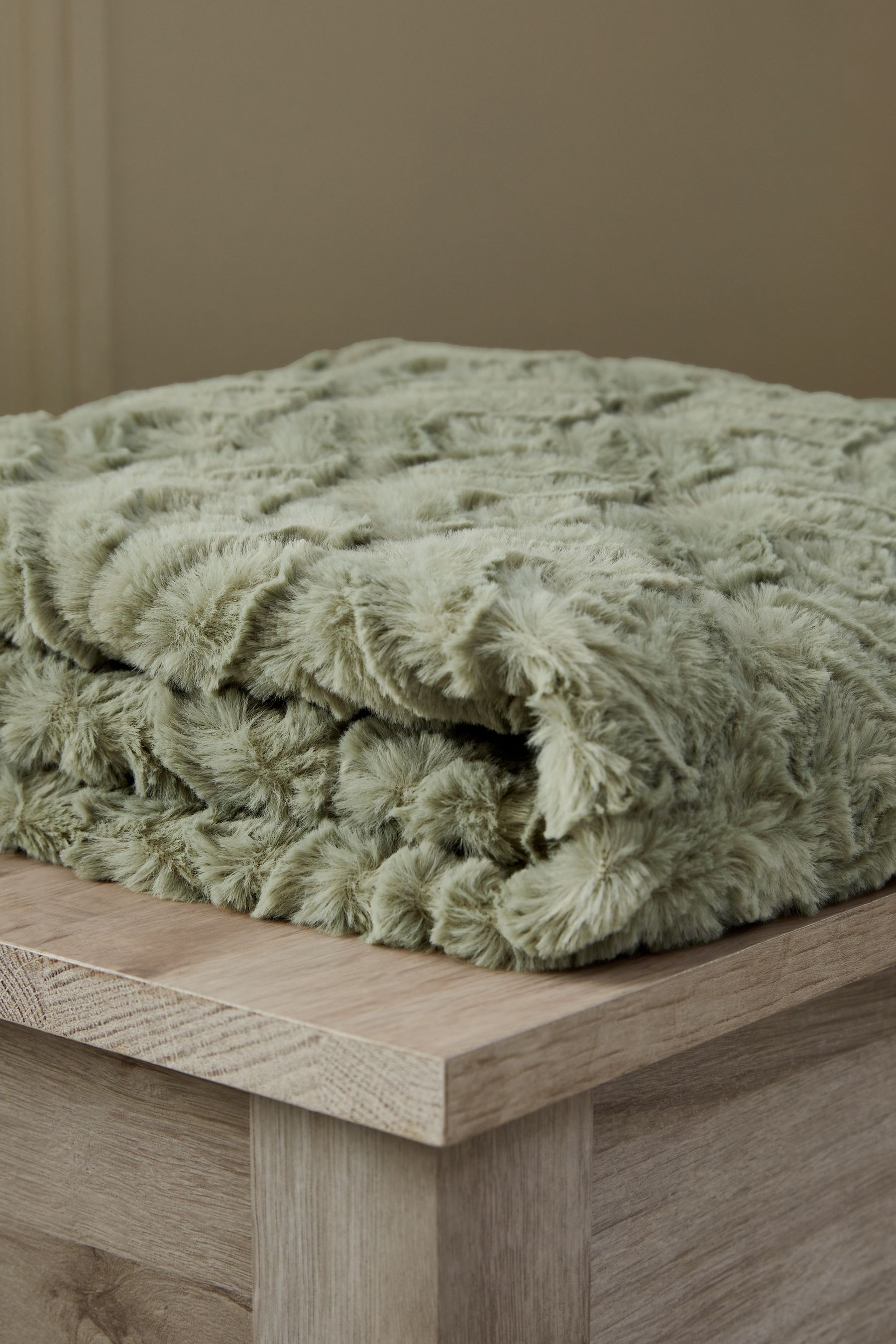 Buy Sage Green Ruby Geometric Faux Fur Throw from Next Luxembourg