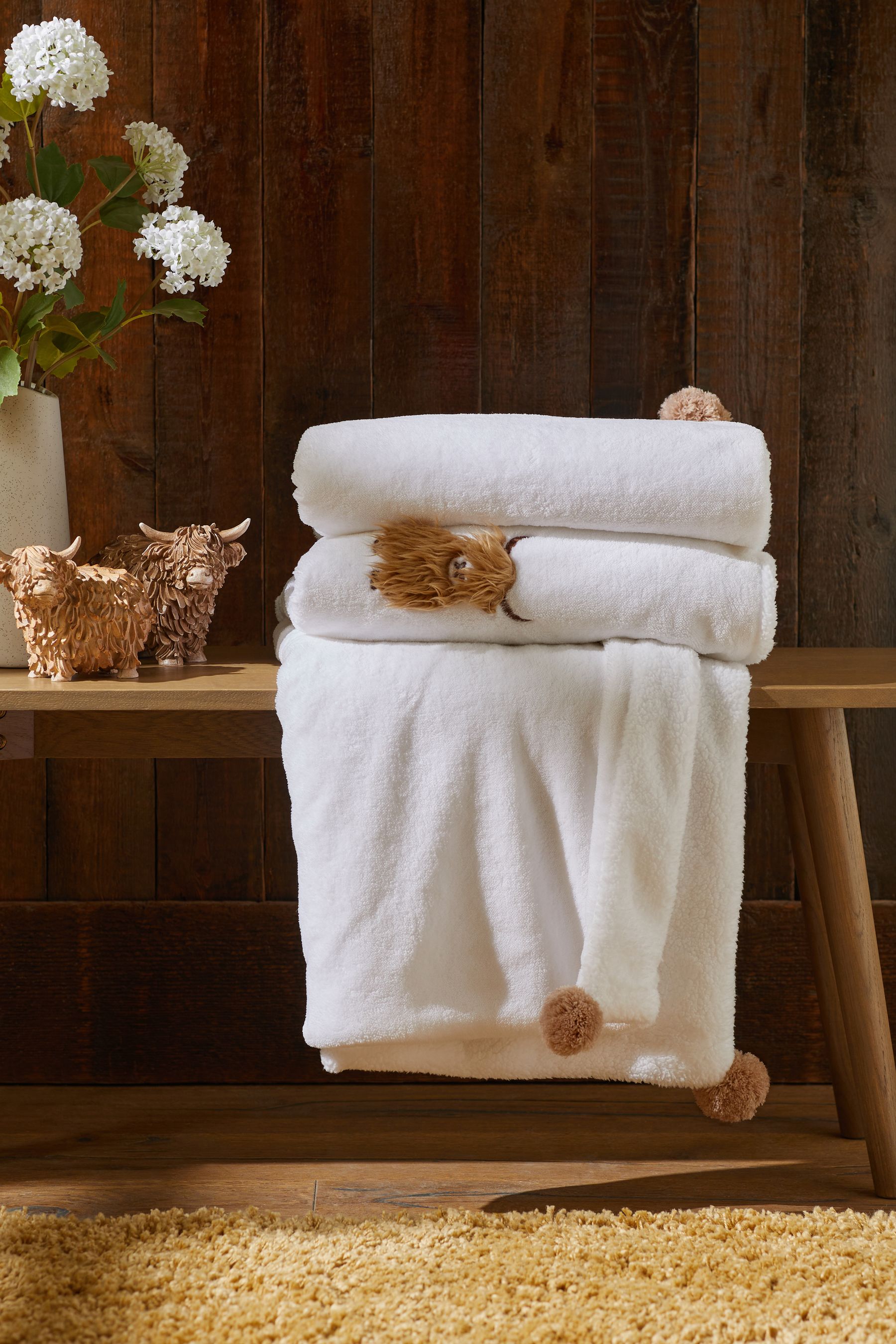 Buy Natural Hamish The Highland Cow Applique Fleece Throw from the Next UK online shop