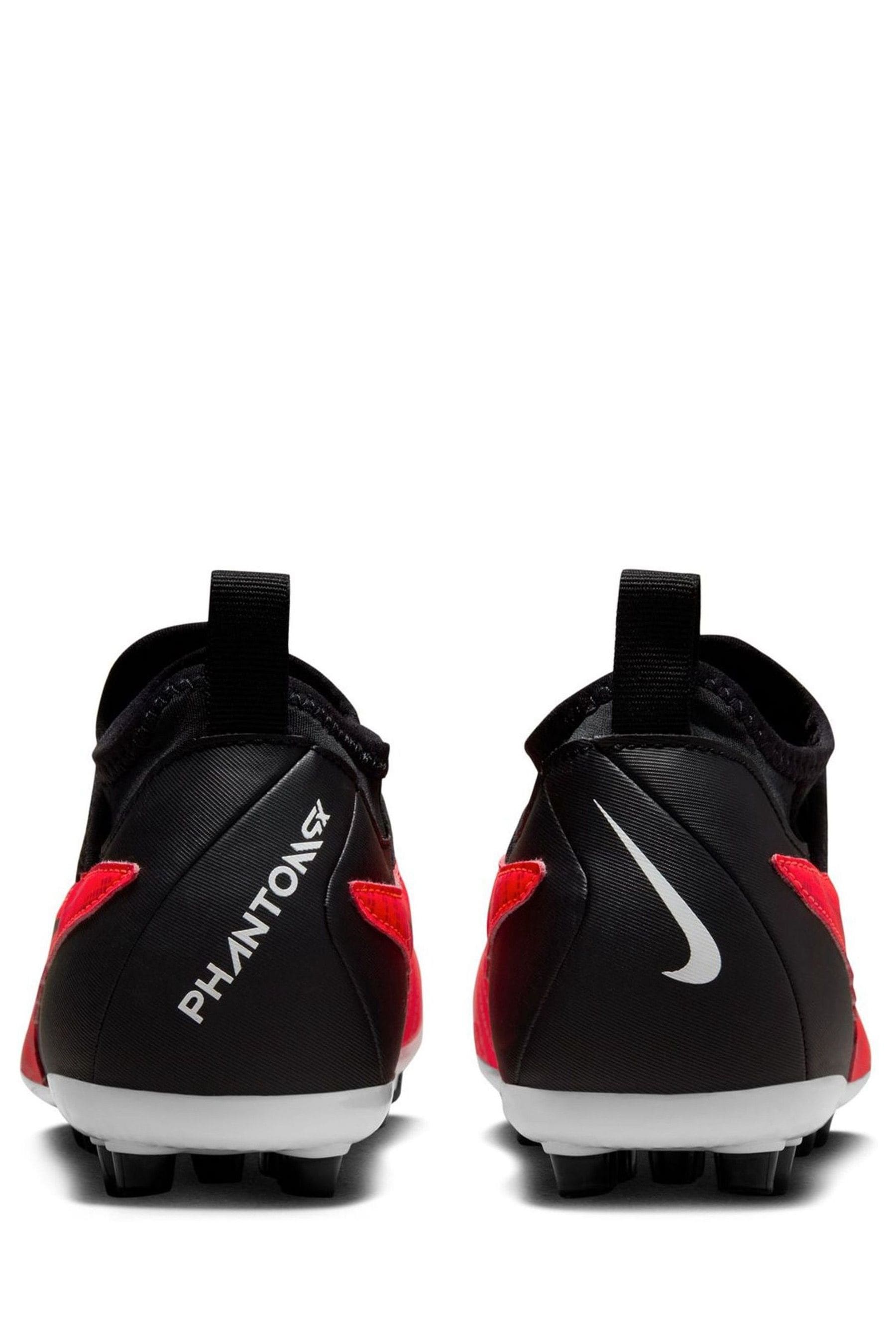 Red and black nike soccer cleats store
