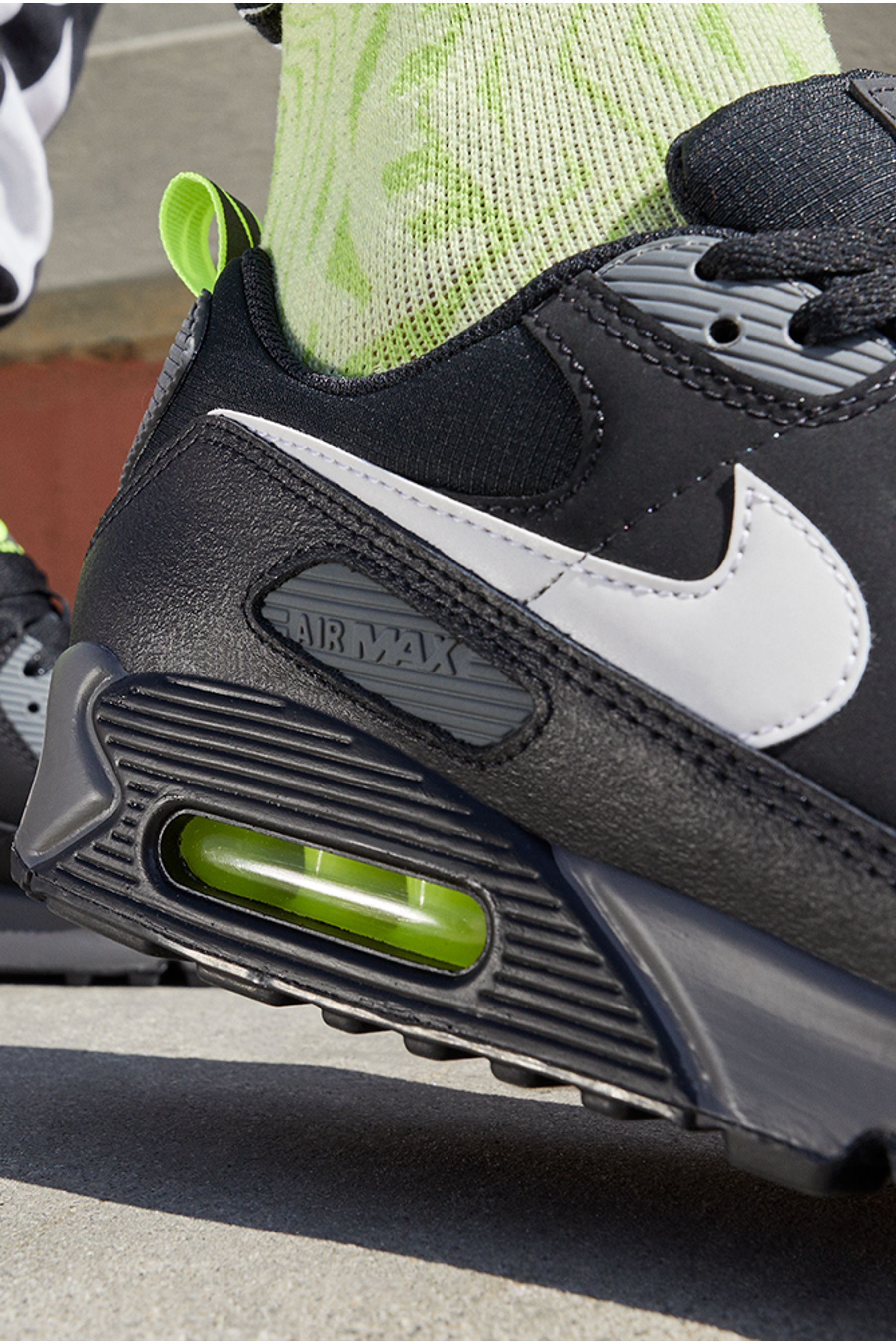 Buy Nike Black Green Air Max 90 Trainers from Next Luxembourg
