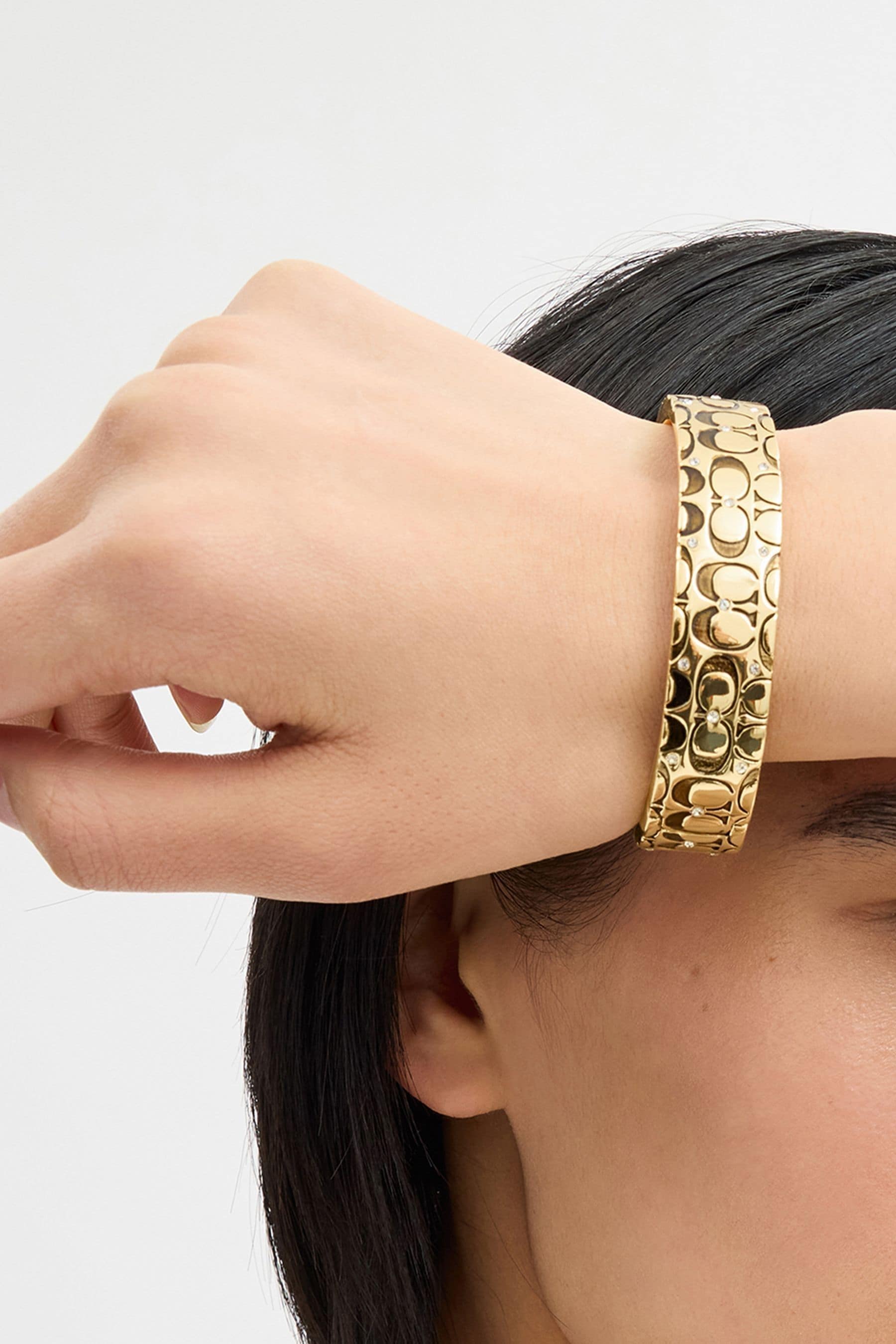 COACH Silver Tone Quilted C Hinged Bangle Bracelet