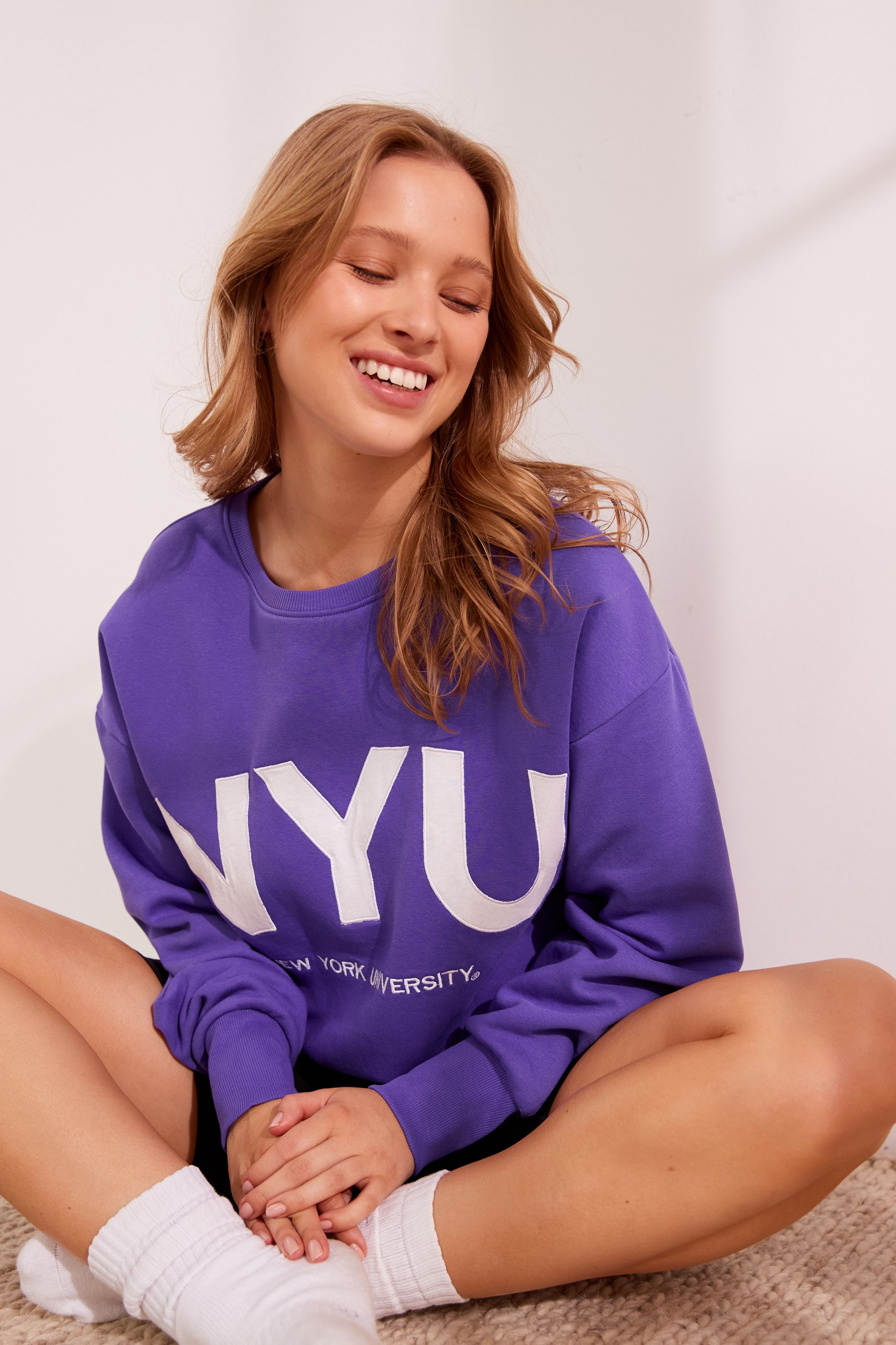 Buy Violet Purple NYU Graphic Sweatshirt from Next Luxembourg