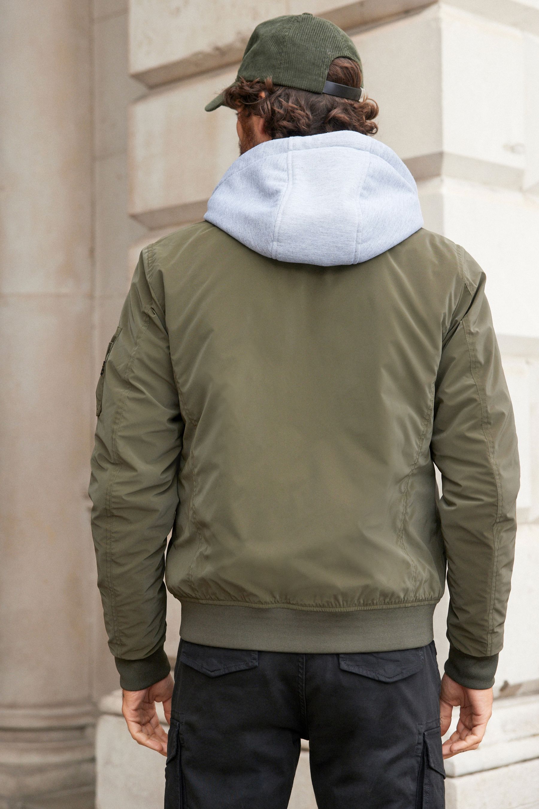 Bomber with hood outlet