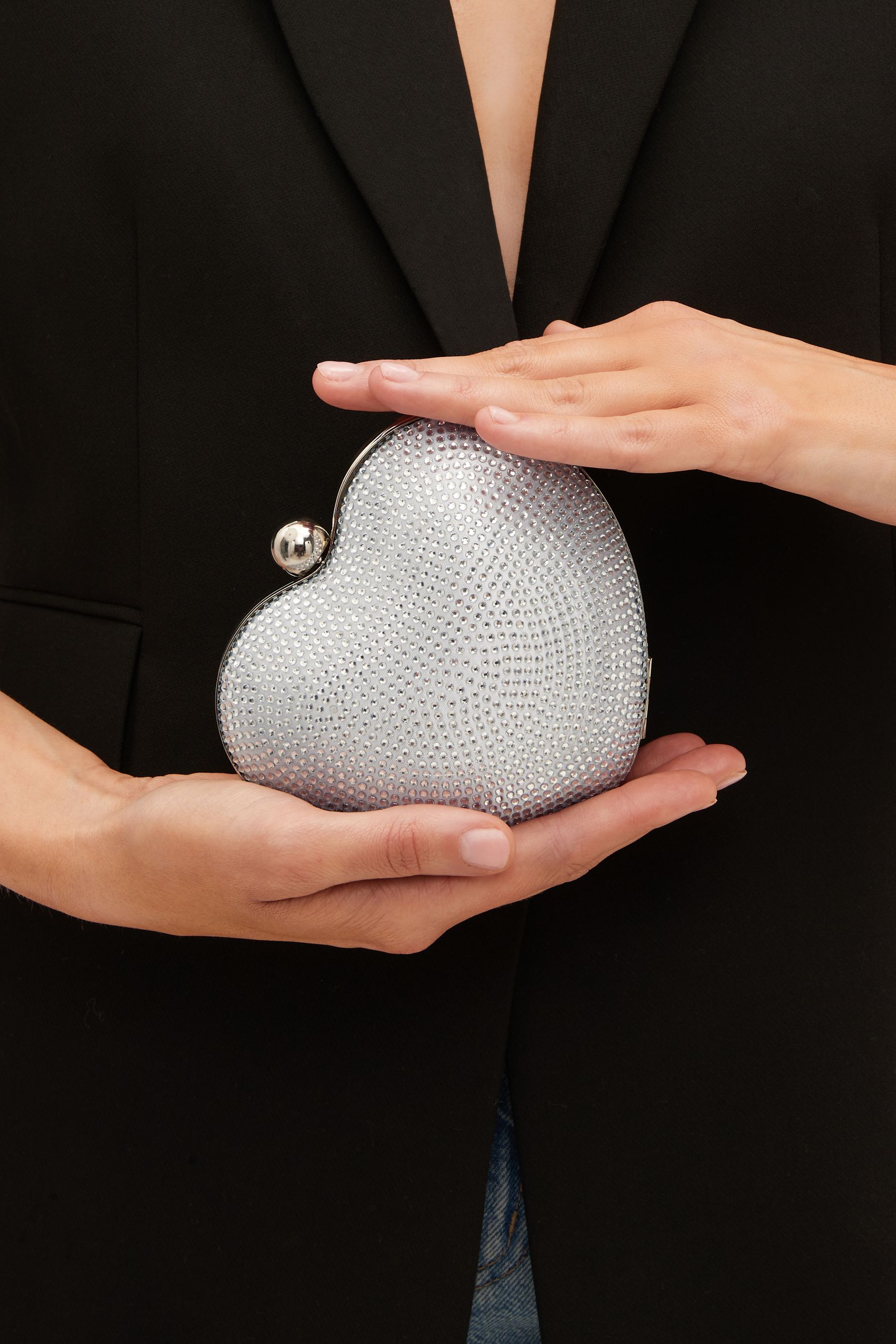Buy Silver Sparkle Heart Clutch Bag from Next Ireland