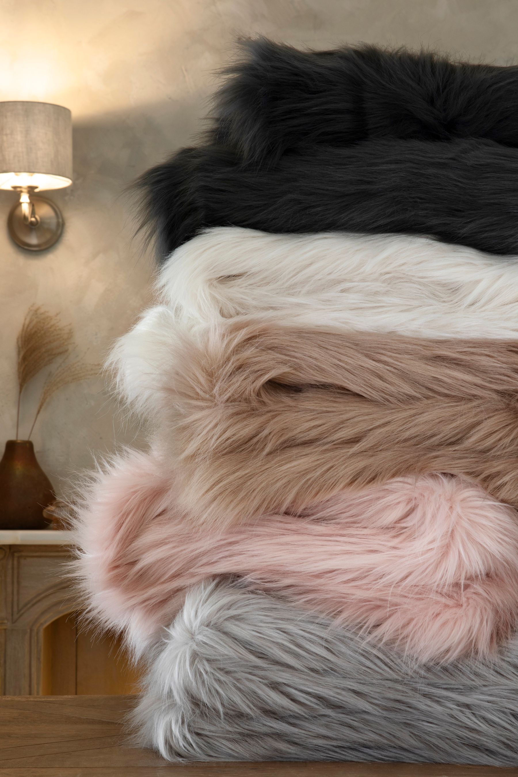 Buy Pink Long Faux Fur Throw from Next Luxembourg