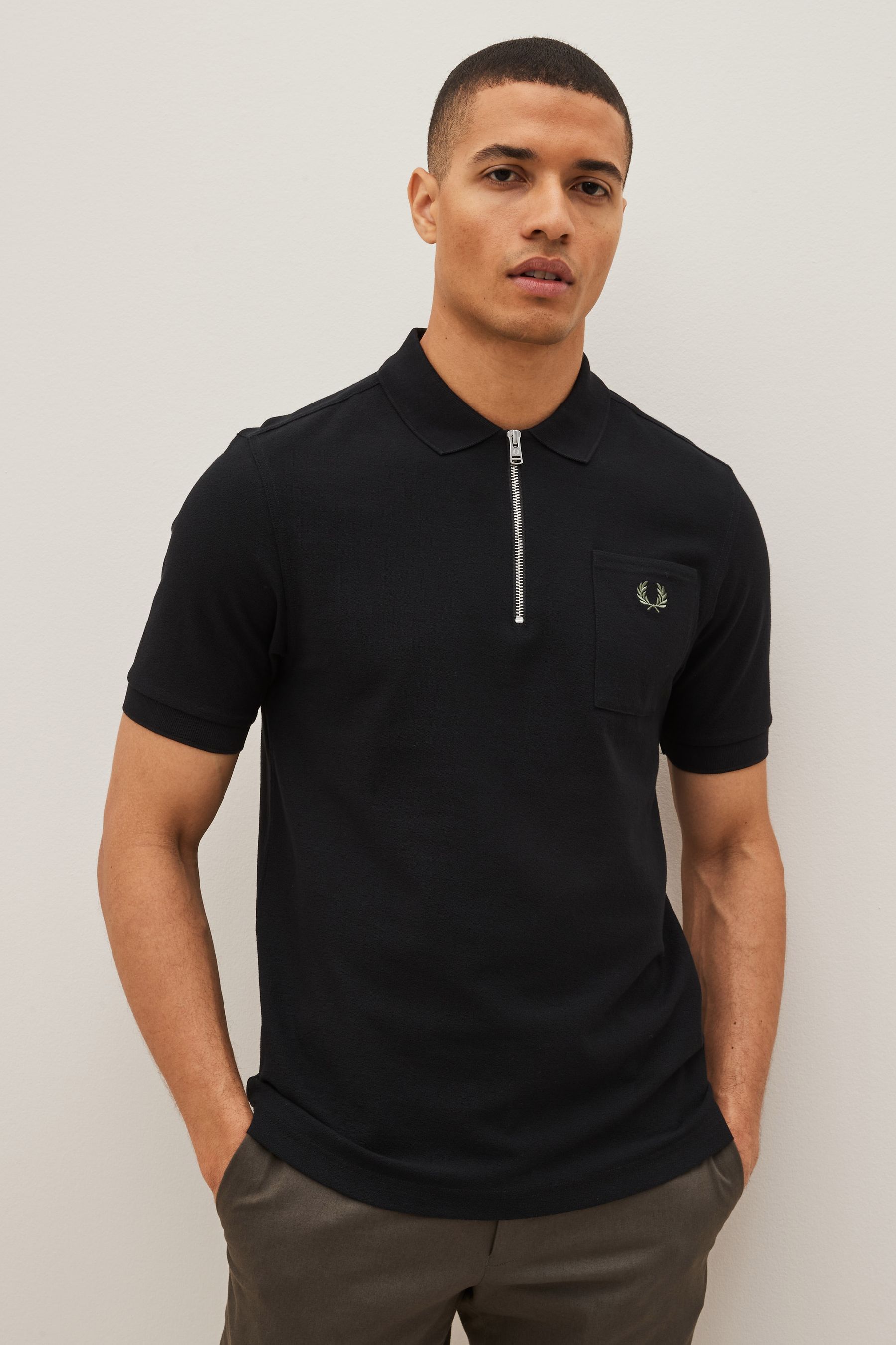 Buy Fred Perry Textured Zip Neck Polo Shirt from Next Luxembourg