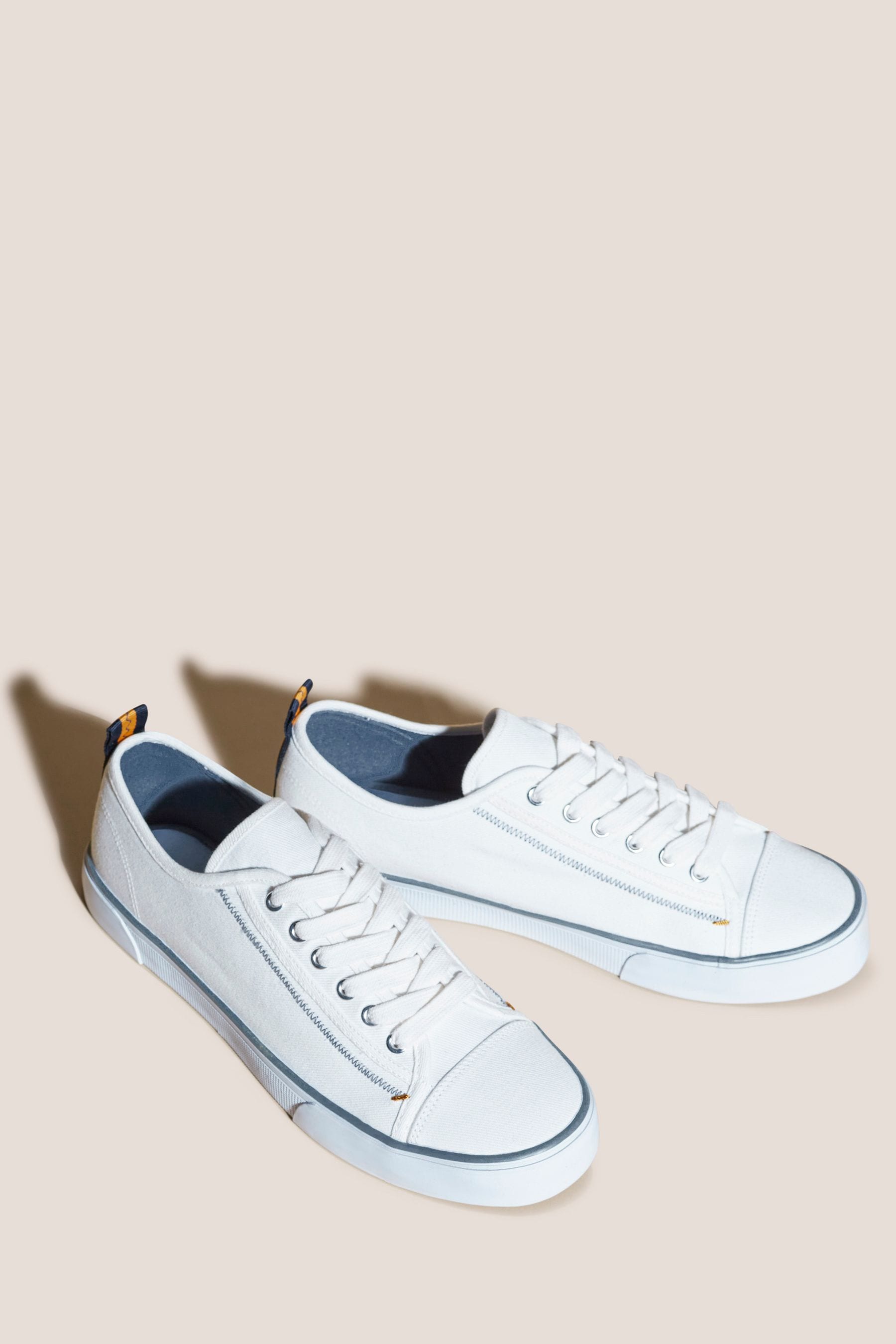 Buy White Stuff White Canvas Lace Up Plimsoll Trainers from Next Luxembourg