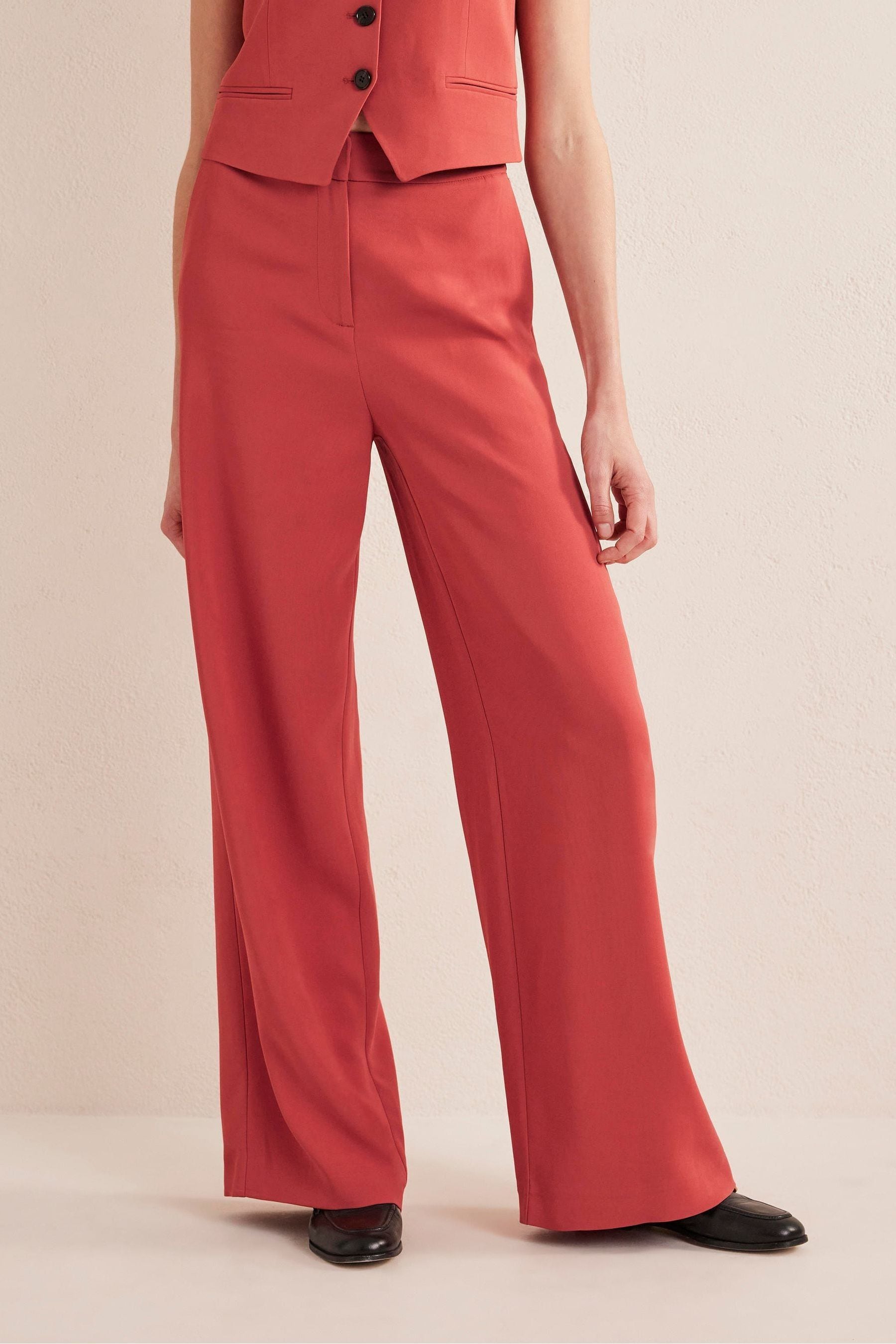 Buy Boden Orange Fluid Wide Leg Trousers from Next Latvia