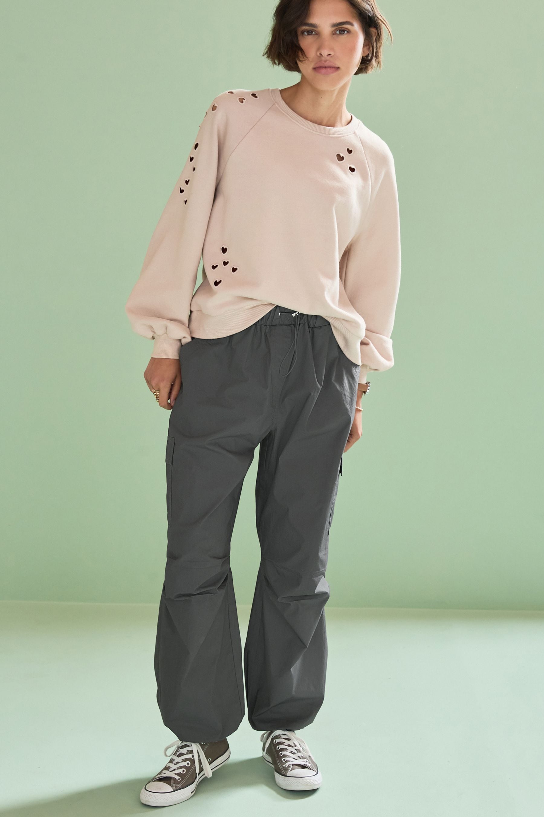 Buy Light Pink Heart Cut Out Detail Sweatshirt from Next Luxembourg