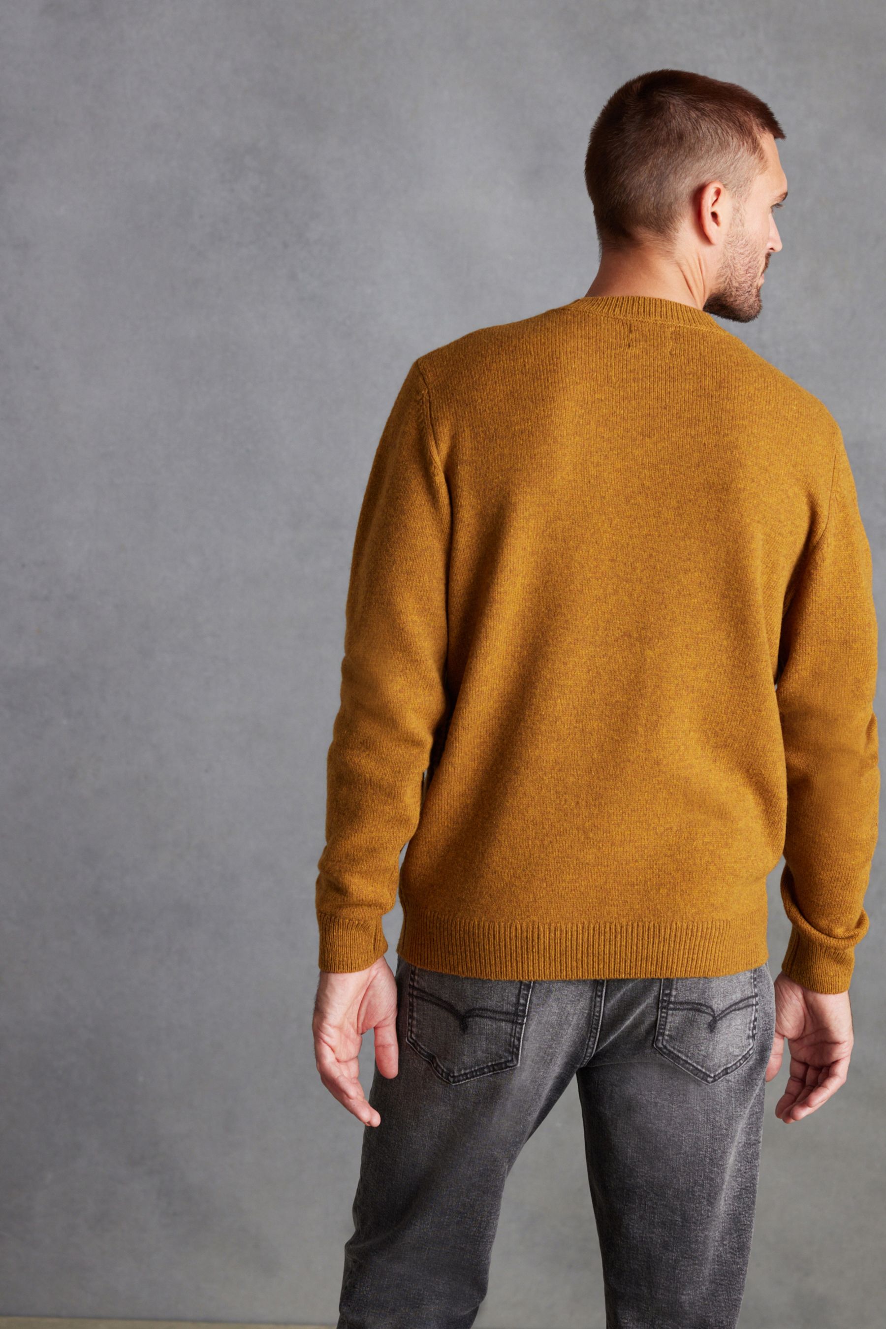 Buy Mustard Yellow Crew Neck Regular Signature Lambswool Jumper from Next Luxembourg