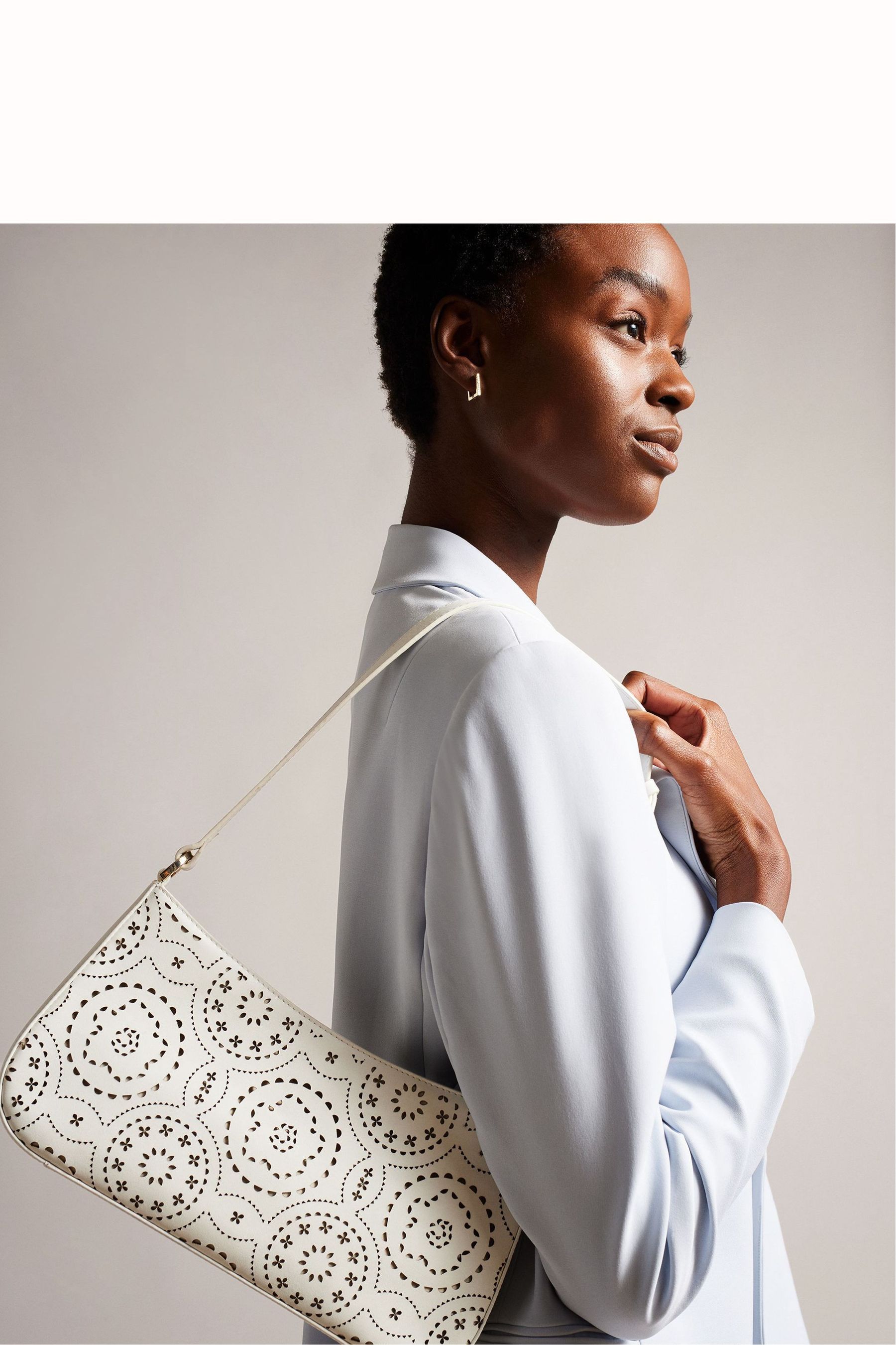 Buy Ted Baker Libily White Laser Cut Magnolia Shoulder Bag from Next Latvia