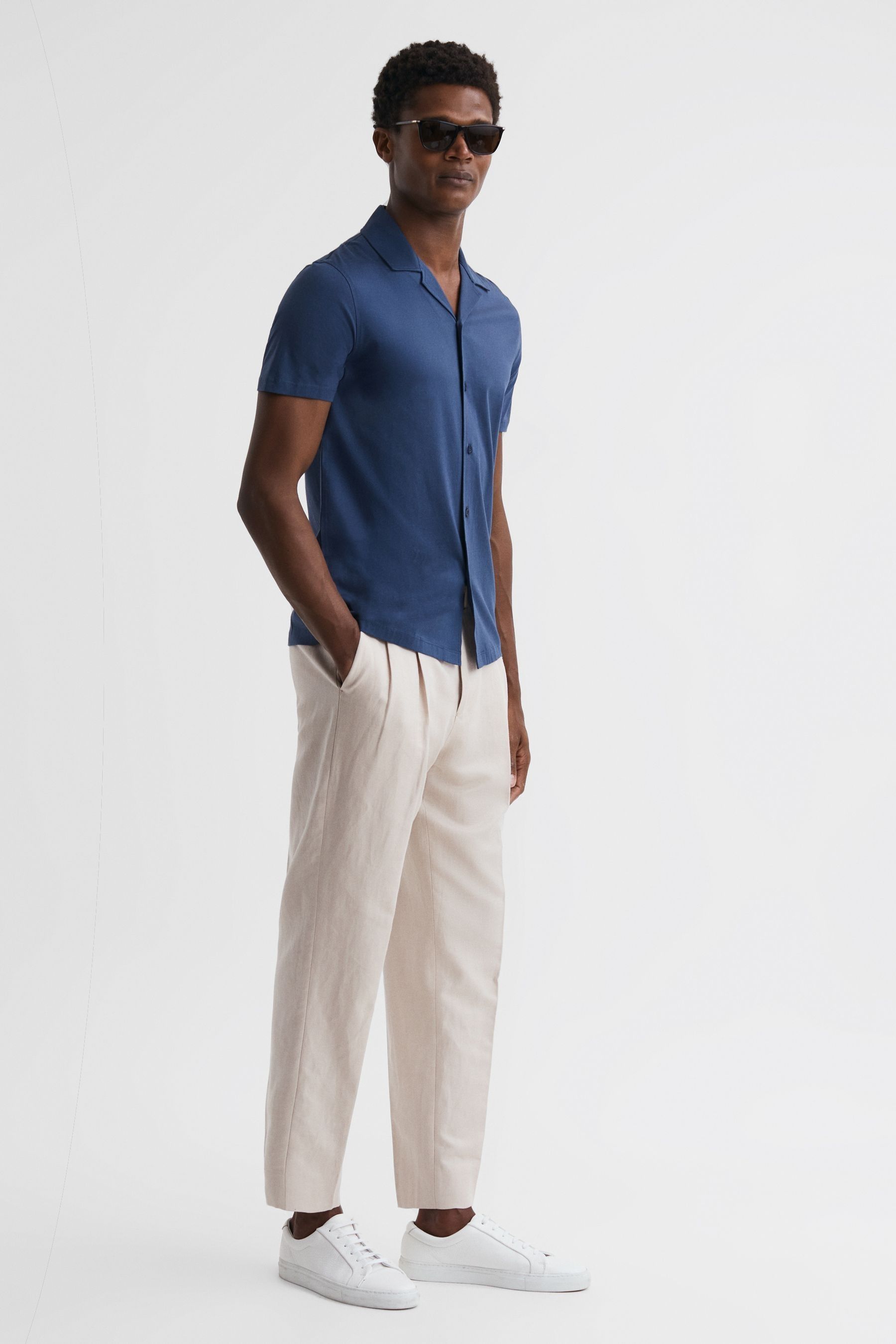 Sweatpants and collared shirt shop