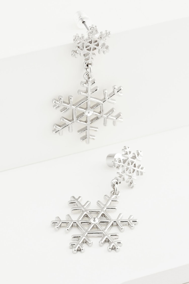 Silver Tone Christmas Snowflake Drop Earrings Made With Recycled Zinc and Brass - Image 1 of 2