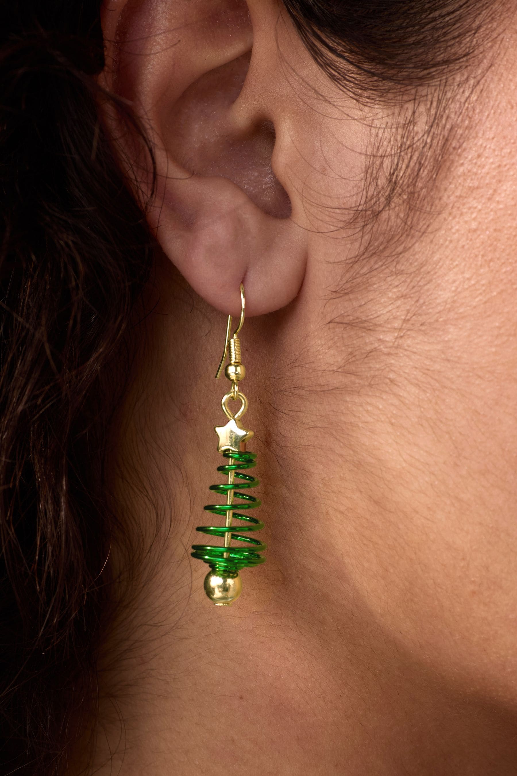 Buy Green Christmas Spiral Tree Drop Earrings Made With Recycled Iron from the Next UK online shop