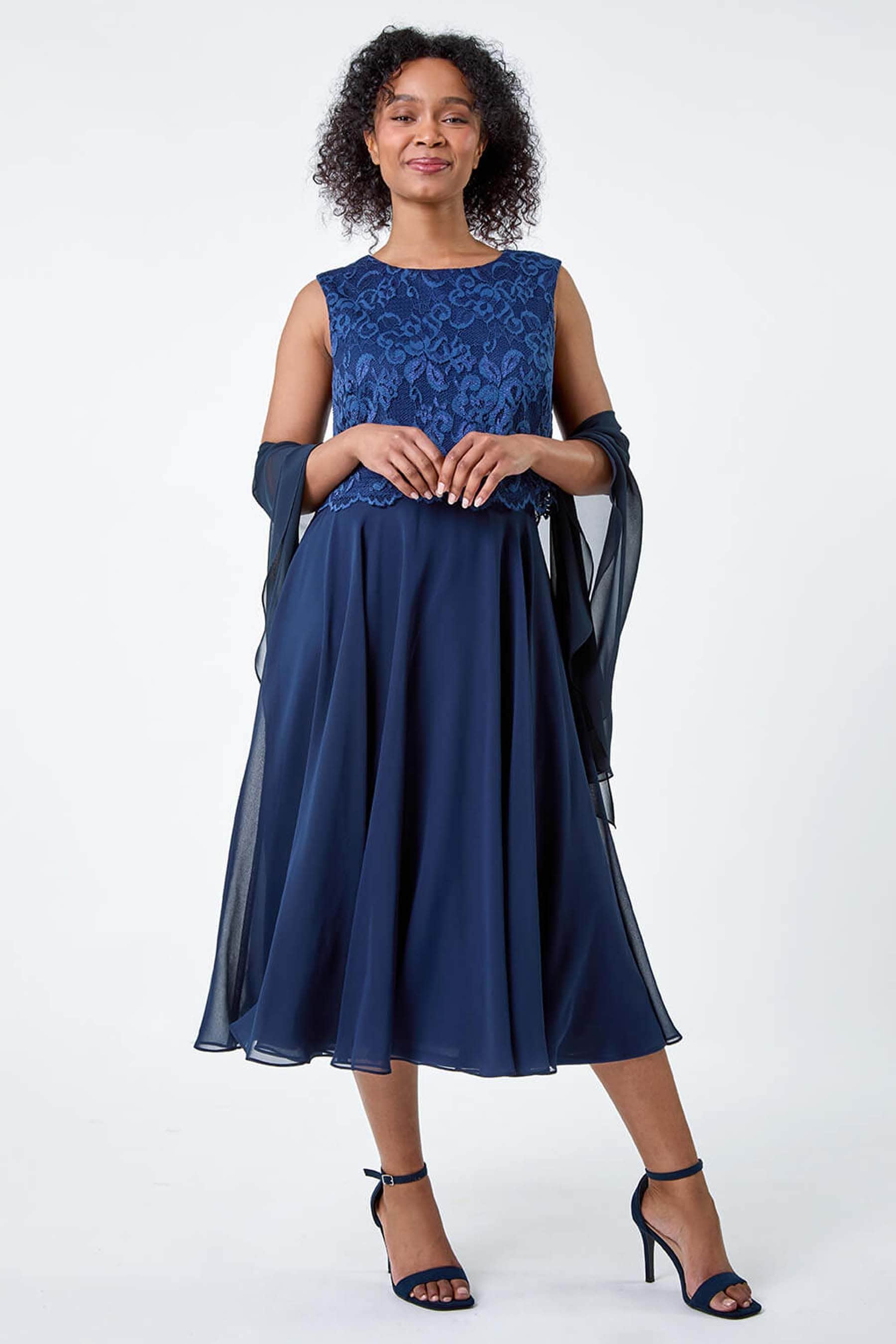 Light blue lace overlay dress shop