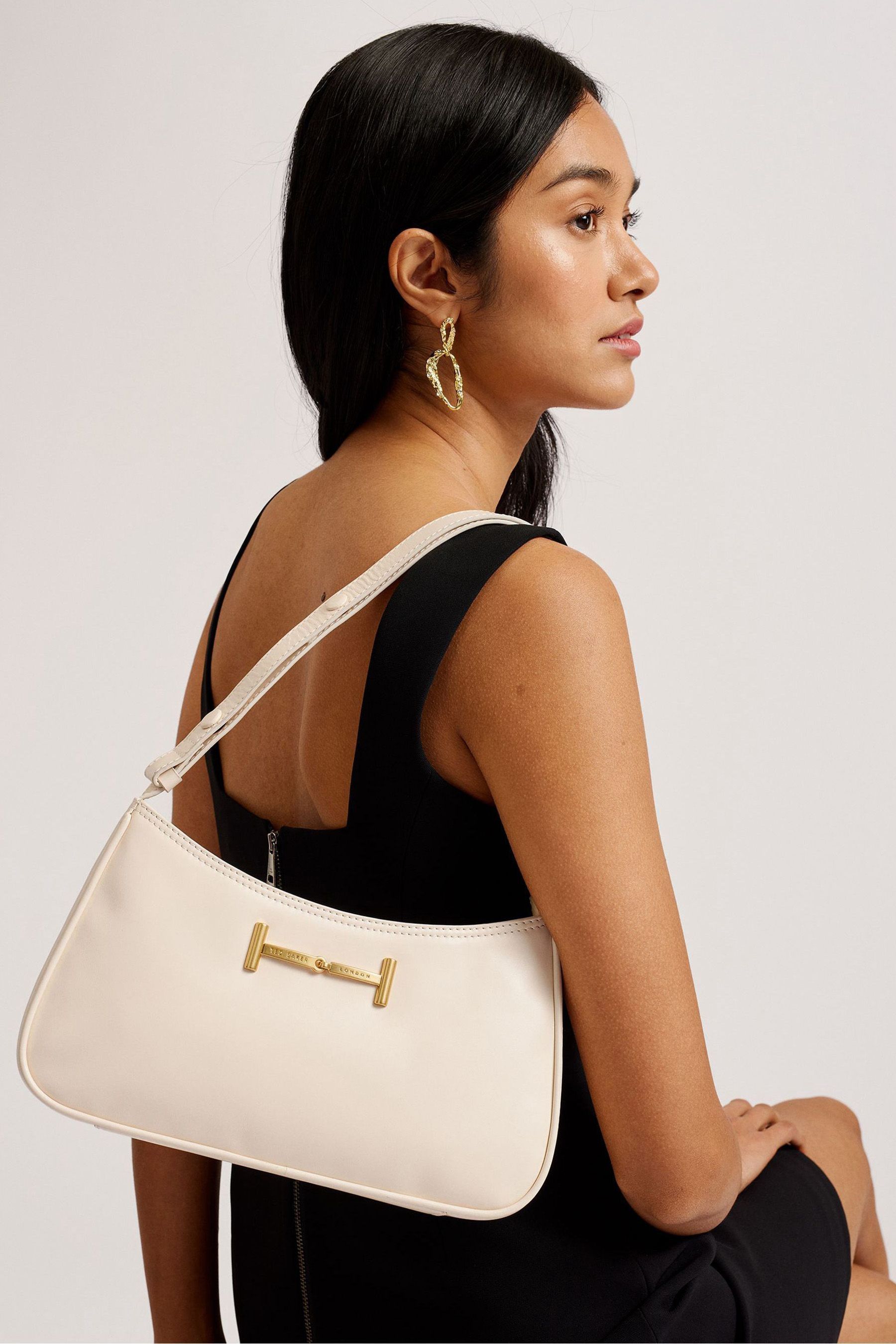 Buy Ted Baker Cream Edalli Equestrian Baguette Bag from Next Luxembourg